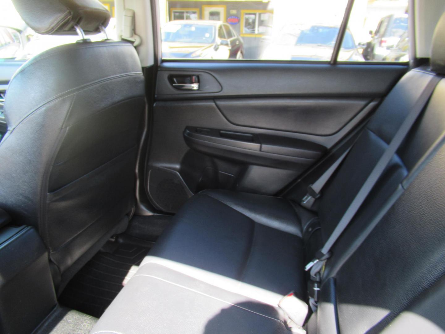 2014 Silver /Black Subaru XV Crosstrek 2.0 Limited (JF2GPAGC2E8) with an 2.0L L4 DOHC 16V engine, Continuously Variable Transmission transmission, located at 1511 North Shepherd Dr., Houston, TX, 77008, (281) 657-1221, 29.798361, -95.412560 - 2014 SUBARU XV CROSSTREK 2.0I LIMITED VIN: JF2GPAGC2E8292177 J F 2 G P A G C 2 E 8 2 9 2 1 7 7 4 DOOR WAGON/SPORT UTILITY 2.0L H4 F DOHC 16V GASOLINE ALL WHEEL DRIVE - Photo#7