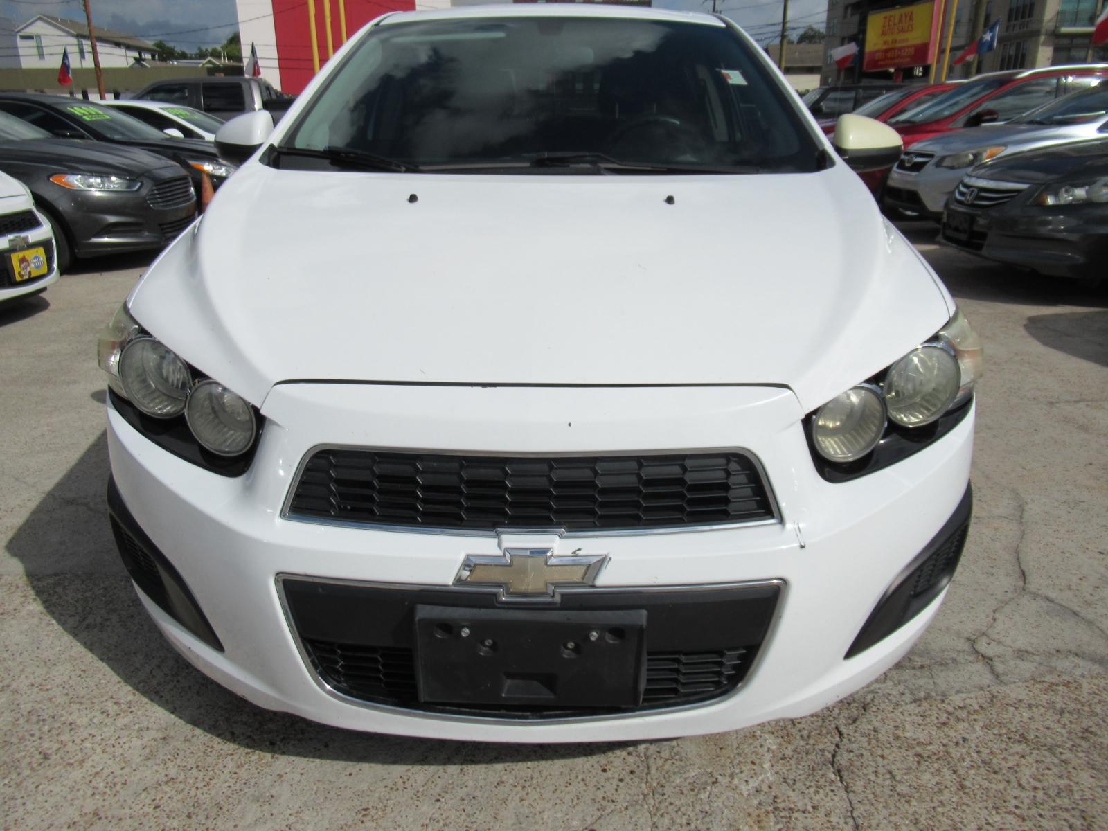 2015 White /Gray Chevrolet Sonic LT Auto 5-Door (1G1JC6SH0F4) with an 1.8L L4 DOHC 24V engine, Automatic transmission, located at 1511 North Shepherd Dr., Houston, TX, 77008, (281) 657-1221, 29.798361, -95.412560 - 2015 CHEVROLET SONIC LT AUTO VIN: 1G1JC6SH0F4109294 1 G 1 J C 6 S H 0 F 4 1 0 9 2 9 4 HATCHBACK 4 DR 1.8L I4 F DOHC 16V GASOLINE FRONT WHEEL DRIVE - Photo #14
