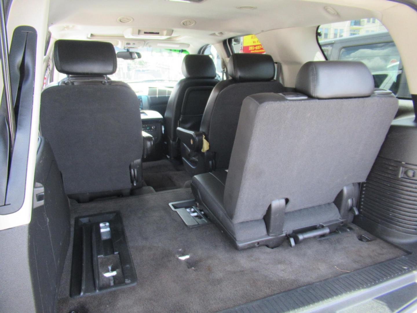 2007 White /Black Chevrolet Tahoe LS 2WD (1GNFC130X7R) with an 5.3L V8 OHV 16V FFV engine, Automatic Overdrive transmission, located at 1511 North Shepherd Dr., Houston, TX, 77008, (281) 657-1221, 29.798361, -95.412560 - 2007 CHEVROLET TAHOE LTZ VIN: 1GNFC130X7R319048 1 G N F C 1 3 0 X 7 R 3 1 9 0 4 8 4 DOOR WAGON/SPORT UTILITY 5.3L V8 F FLEX FUEL REAR WHEEL DRIVE - Photo#14
