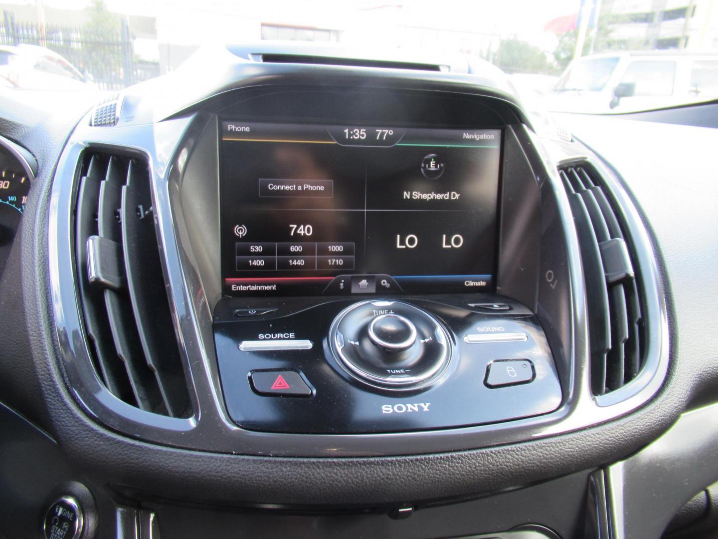 2014 Red /Black Ford Escape Titanium (1FMCU0J98EU) with an 2.0 engine, Automatic transmission, located at 1511 North Shepherd Dr., Houston, TX, 77008, (281) 657-1221, 29.798361, -95.412560 - 2014 FORD ESCAPE TITANIUM VIN: 1FMCU0J98EUA29272 1 F M C U 0 J 9 8 E U A 2 9 2 7 2 4 DOOR WAGON/SPORT UTILITY 2.0L I4 F DOHC 16V GASOLINE FRONT WHEEL DRIVE - Photo#2