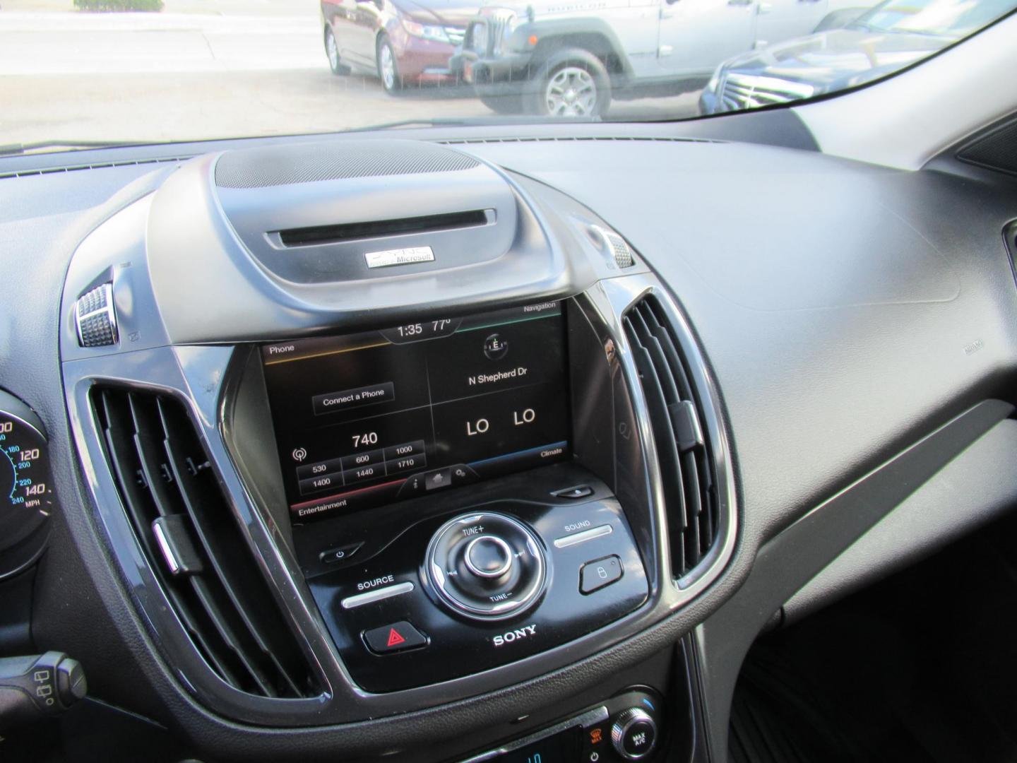 2014 Red /Black Ford Escape Titanium (1FMCU0J98EU) with an 2.0 engine, Automatic transmission, located at 1511 North Shepherd Dr., Houston, TX, 77008, (281) 657-1221, 29.798361, -95.412560 - 2014 FORD ESCAPE TITANIUM VIN: 1FMCU0J98EUA29272 1 F M C U 0 J 9 8 E U A 2 9 2 7 2 4 DOOR WAGON/SPORT UTILITY 2.0L I4 F DOHC 16V GASOLINE FRONT WHEEL DRIVE - Photo#3