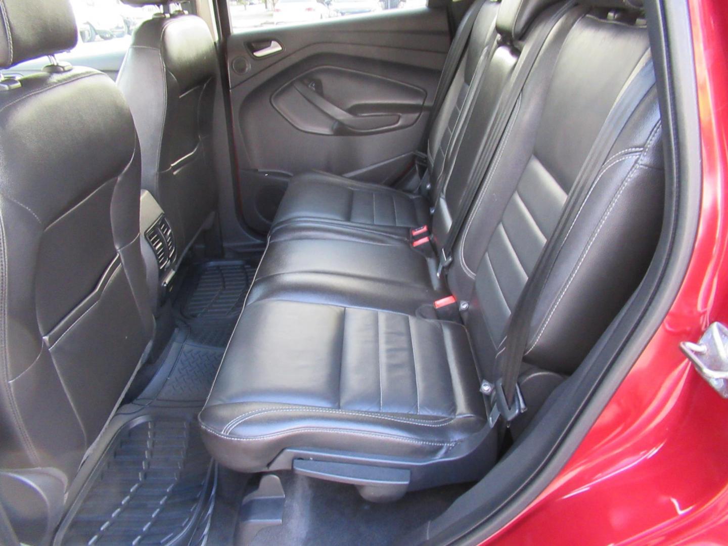 2014 Red /Black Ford Escape Titanium (1FMCU0J98EU) with an 2.0 engine, Automatic transmission, located at 1511 North Shepherd Dr., Houston, TX, 77008, (281) 657-1221, 29.798361, -95.412560 - 2014 FORD ESCAPE TITANIUM VIN: 1FMCU0J98EUA29272 1 F M C U 0 J 9 8 E U A 2 9 2 7 2 4 DOOR WAGON/SPORT UTILITY 2.0L I4 F DOHC 16V GASOLINE FRONT WHEEL DRIVE - Photo#9