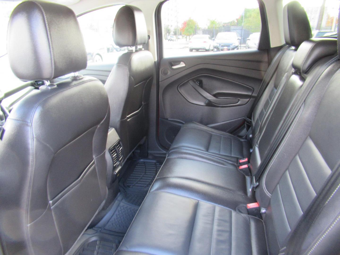 2014 Red /Black Ford Escape Titanium (1FMCU0J98EU) with an 2.0 engine, Automatic transmission, located at 1511 North Shepherd Dr., Houston, TX, 77008, (281) 657-1221, 29.798361, -95.412560 - 2014 FORD ESCAPE TITANIUM VIN: 1FMCU0J98EUA29272 1 F M C U 0 J 9 8 E U A 2 9 2 7 2 4 DOOR WAGON/SPORT UTILITY 2.0L I4 F DOHC 16V GASOLINE FRONT WHEEL DRIVE - Photo#10