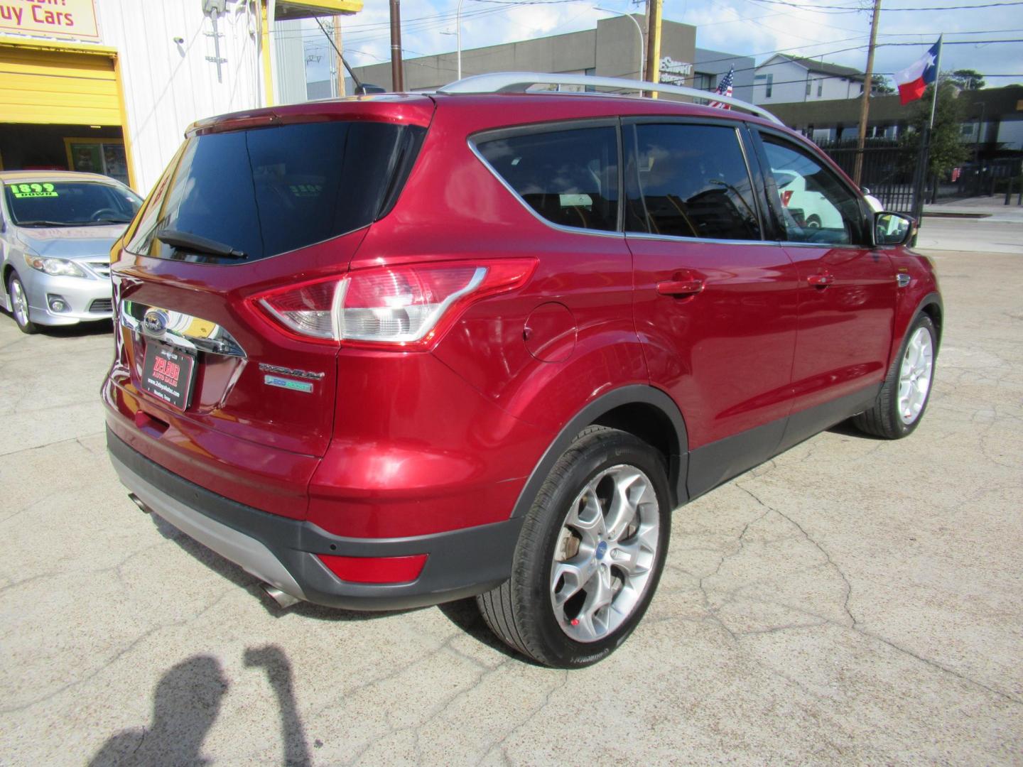 2014 Red /Black Ford Escape Titanium (1FMCU0J98EU) with an 2.0 engine, Automatic transmission, located at 1511 North Shepherd Dr., Houston, TX, 77008, (281) 657-1221, 29.798361, -95.412560 - 2014 FORD ESCAPE TITANIUM VIN: 1FMCU0J98EUA29272 1 F M C U 0 J 9 8 E U A 2 9 2 7 2 4 DOOR WAGON/SPORT UTILITY 2.0L I4 F DOHC 16V GASOLINE FRONT WHEEL DRIVE - Photo#19
