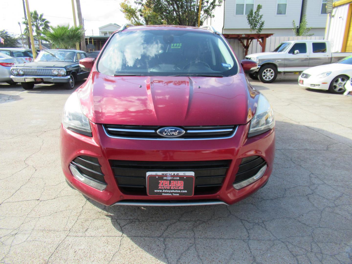 2014 Red /Black Ford Escape Titanium (1FMCU0J98EU) with an 2.0 engine, Automatic transmission, located at 1511 North Shepherd Dr., Houston, TX, 77008, (281) 657-1221, 29.798361, -95.412560 - 2014 FORD ESCAPE TITANIUM VIN: 1FMCU0J98EUA29272 1 F M C U 0 J 9 8 E U A 2 9 2 7 2 4 DOOR WAGON/SPORT UTILITY 2.0L I4 F DOHC 16V GASOLINE FRONT WHEEL DRIVE - Photo#21