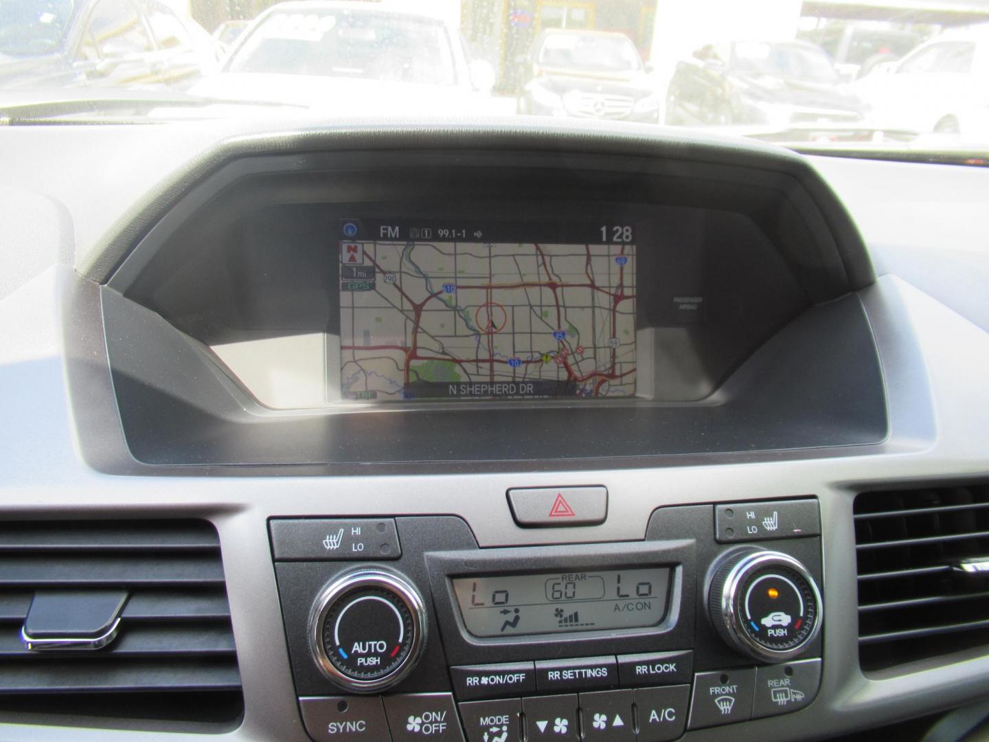 2016 Silver /Gray Honda Odyssey Touring (5FNRL5H96GB) with an 3.5L V6 SOHC 24V engine, Automatic transmission, located at 1511 North Shepherd Dr., Houston, TX, 77008, (281) 657-1221, 29.798361, -95.412560 - 2016 HONDA ODYSSEY TOURING VIN: 5FNRL5H96GB129581 5 F N R L 5 H 9 6 G B 1 2 9 5 8 1 VAN 3.5L V6 F SOHC 24V GASOLINE FRONT WHEEL DRIVE - Photo#3