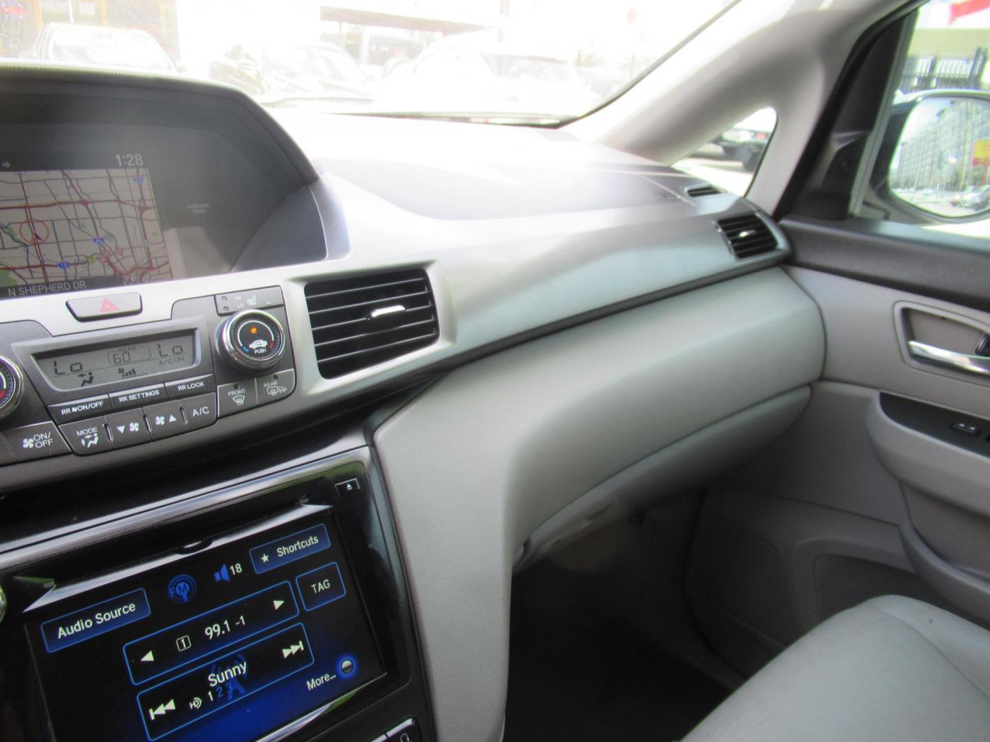 2016 Silver /Gray Honda Odyssey Touring (5FNRL5H96GB) with an 3.5L V6 SOHC 24V engine, Automatic transmission, located at 1511 North Shepherd Dr., Houston, TX, 77008, (281) 657-1221, 29.798361, -95.412560 - 2016 HONDA ODYSSEY TOURING VIN: 5FNRL5H96GB129581 5 F N R L 5 H 9 6 G B 1 2 9 5 8 1 VAN 3.5L V6 F SOHC 24V GASOLINE FRONT WHEEL DRIVE - Photo#2