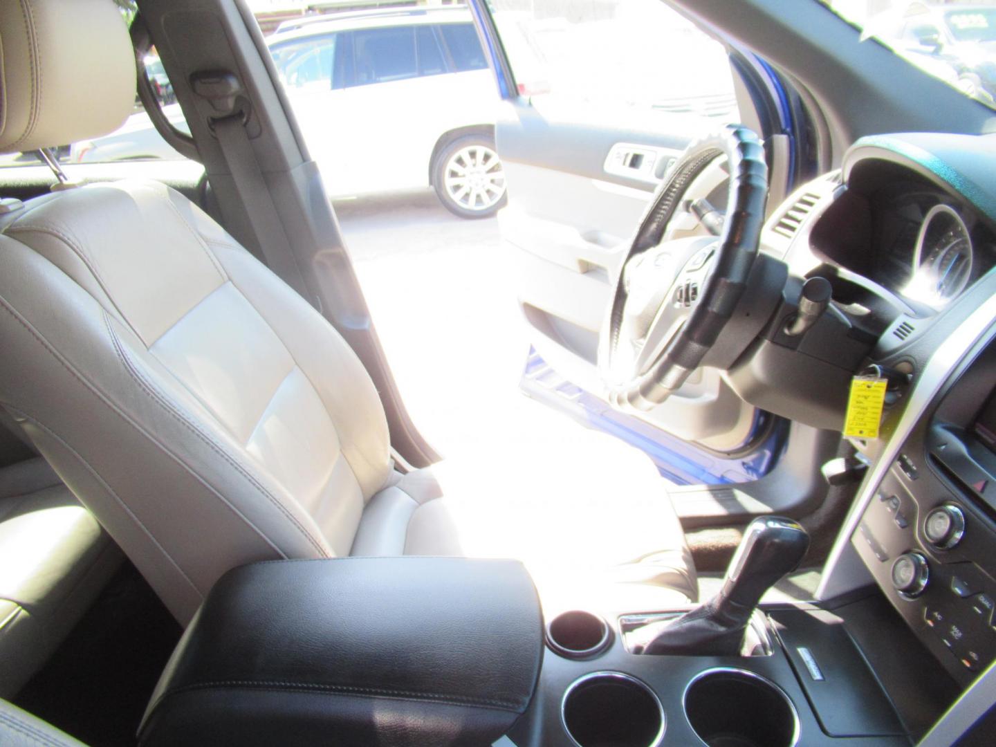 2013 Blue /Tan Ford Explorer XLT (1FM5K7D91DG) with an 2.0L I4 F DOHC 16V engine, Automatic transmission, located at 1511 North Shepherd Dr., Houston, TX, 77008, (281) 657-1221, 29.798361, -95.412560 - 2013 FORD EXPLORER XLT VIN: 1FM5K7D91DGA50027 1 F M 5 K 7 D 9 1 D G A 5 0 0 2 7 4 DOOR WAGON/SPORT UTILITY 2.0L I4 F DOHC 16V GASOLINE FRONT WHEEL DRIVE - Photo#1