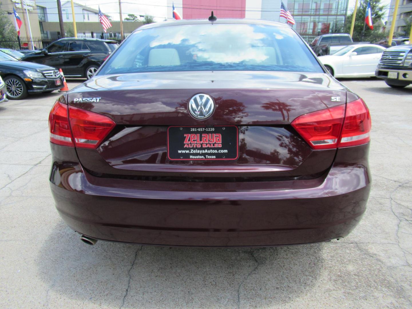 2014 MAROON /Tan Volkswagen Passat 2.5L SE PZEV (1VWBP7A37EC) with an 2.5L I5 F DOHC 20V engine, Automatic transmission, located at 1511 North Shepherd Dr., Houston, TX, 77008, (281) 657-1221, 29.798361, -95.412560 - 2014 VOLKSWAGEN PASSAT 2.5L SE PZEV VIN: 1VWBP7A37EC014695 1 V W B P 7 A 3 7 E C 0 1 4 6 9 5 SEDAN 4 DR 2.5L I5 F DOHC 20V GASOLINE FRONT WHEEL DRIVE - Photo#10