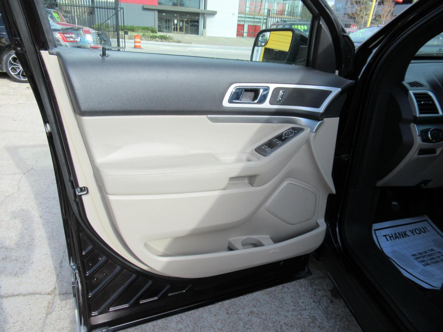 2014 Black /Tan Ford Explorer EXPLORER XLT (1FM5K7D88EG) with an 3.5L V6 F DOHC 24V engine, Automatic transmission, located at 1511 North Shepherd Dr., Houston, TX, 77008, (281) 657-1221, 29.798361, -95.412560 - 2014 FORD EXPLORER XLT VIN: 1FM5K7D88EGA37316 1 F M 5 K 7 D 8 8 E G A 3 7 3 1 6 4 DOOR WAGON/SPORT UTILITY 3.5L V6 F DOHC 24V GASOLINE FRONT WHEEL DRIVE ABS TRACTION CONTROL LIGHT ON - Photo#3