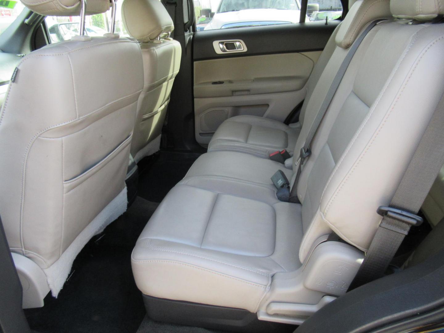 2014 Black /Tan Ford Explorer EXPLORER XLT (1FM5K7D88EG) with an 3.5L V6 F DOHC 24V engine, Automatic transmission, located at 1511 North Shepherd Dr., Houston, TX, 77008, (281) 657-1221, 29.798361, -95.412560 - 2014 FORD EXPLORER XLT VIN: 1FM5K7D88EGA37316 1 F M 5 K 7 D 8 8 E G A 3 7 3 1 6 4 DOOR WAGON/SPORT UTILITY 3.5L V6 F DOHC 24V GASOLINE FRONT WHEEL DRIVE ABS TRACTION CONTROL LIGHT ON - Photo#4