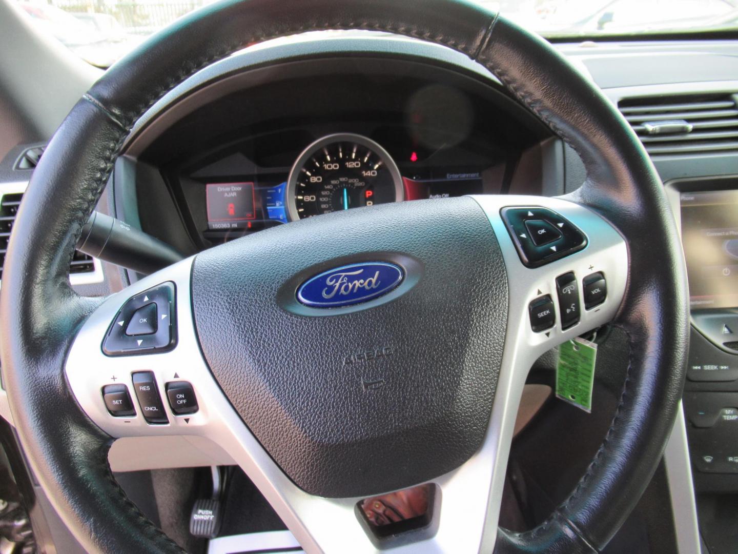 2014 Black /Tan Ford Explorer EXPLORER XLT (1FM5K7D88EG) with an 3.5L V6 F DOHC 24V engine, Automatic transmission, located at 1511 North Shepherd Dr., Houston, TX, 77008, (281) 657-1221, 29.798361, -95.412560 - 2014 FORD EXPLORER XLT VIN: 1FM5K7D88EGA37316 1 F M 5 K 7 D 8 8 E G A 3 7 3 1 6 4 DOOR WAGON/SPORT UTILITY 3.5L V6 F DOHC 24V GASOLINE FRONT WHEEL DRIVE ABS TRACTION CONTROL LIGHT ON - Photo#7