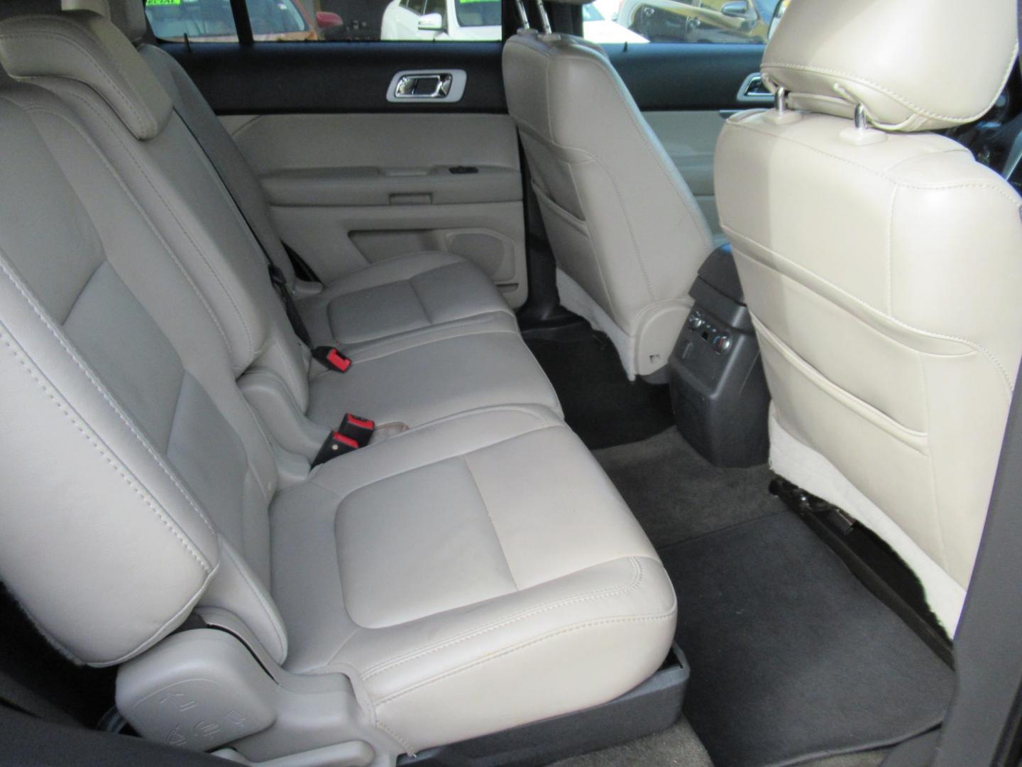 2014 Black /Tan Ford Explorer EXPLORER XLT (1FM5K7D88EG) with an 3.5L V6 F DOHC 24V engine, Automatic transmission, located at 1511 North Shepherd Dr., Houston, TX, 77008, (281) 657-1221, 29.798361, -95.412560 - 2014 FORD EXPLORER XLT VIN: 1FM5K7D88EGA37316 1 F M 5 K 7 D 8 8 E G A 3 7 3 1 6 4 DOOR WAGON/SPORT UTILITY 3.5L V6 F DOHC 24V GASOLINE FRONT WHEEL DRIVE - Photo#11