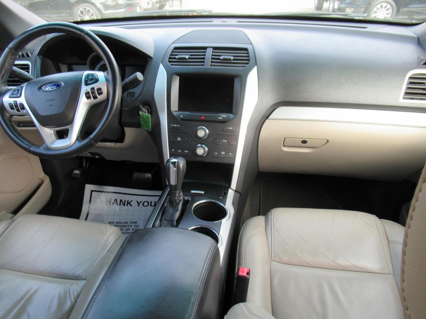 2014 Black /Tan Ford Explorer EXPLORER XLT (1FM5K7D88EG) with an 3.5L V6 F DOHC 24V engine, Automatic transmission, located at 1511 North Shepherd Dr., Houston, TX, 77008, (281) 657-1221, 29.798361, -95.412560 - 2014 FORD EXPLORER XLT VIN: 1FM5K7D88EGA37316 1 F M 5 K 7 D 8 8 E G A 3 7 3 1 6 4 DOOR WAGON/SPORT UTILITY 3.5L V6 F DOHC 24V GASOLINE FRONT WHEEL DRIVE ABS TRACTION CONTROL LIGHT ON - Photo#14