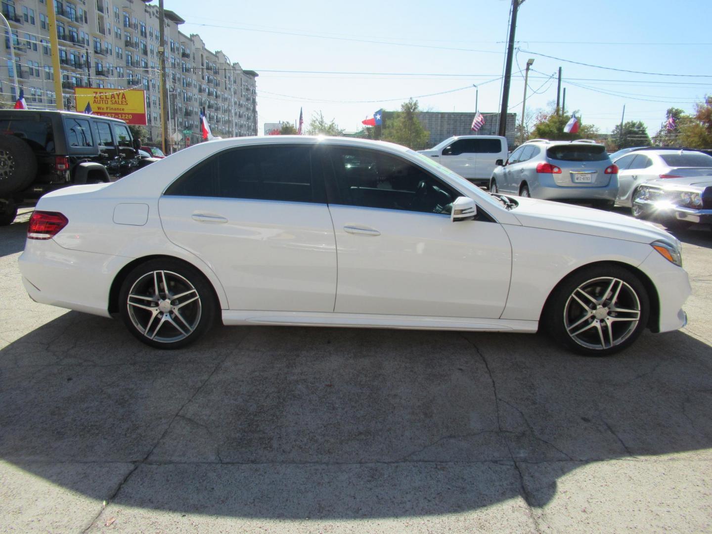 2015 White /Tan Mercedes-Benz E-Class E 350 (WDDHF5KB1FB) with an 3.5L V6 F DOHC 24V engine, Automatic transmission, located at 1511 North Shepherd Dr., Houston, TX, 77008, (281) 657-1221, 29.798361, -95.412560 - 2015 MERCEDES-BENZ E-CLASS E 350 VIN: WDDHF5KB1FB158704 W D D H F 5 K B 1 F B 1 5 8 7 0 4 SEDAN 4 DR 3.5L V6 F DOHC 24V GASOLINE REAR WHEEL DRIVE - Photo#16