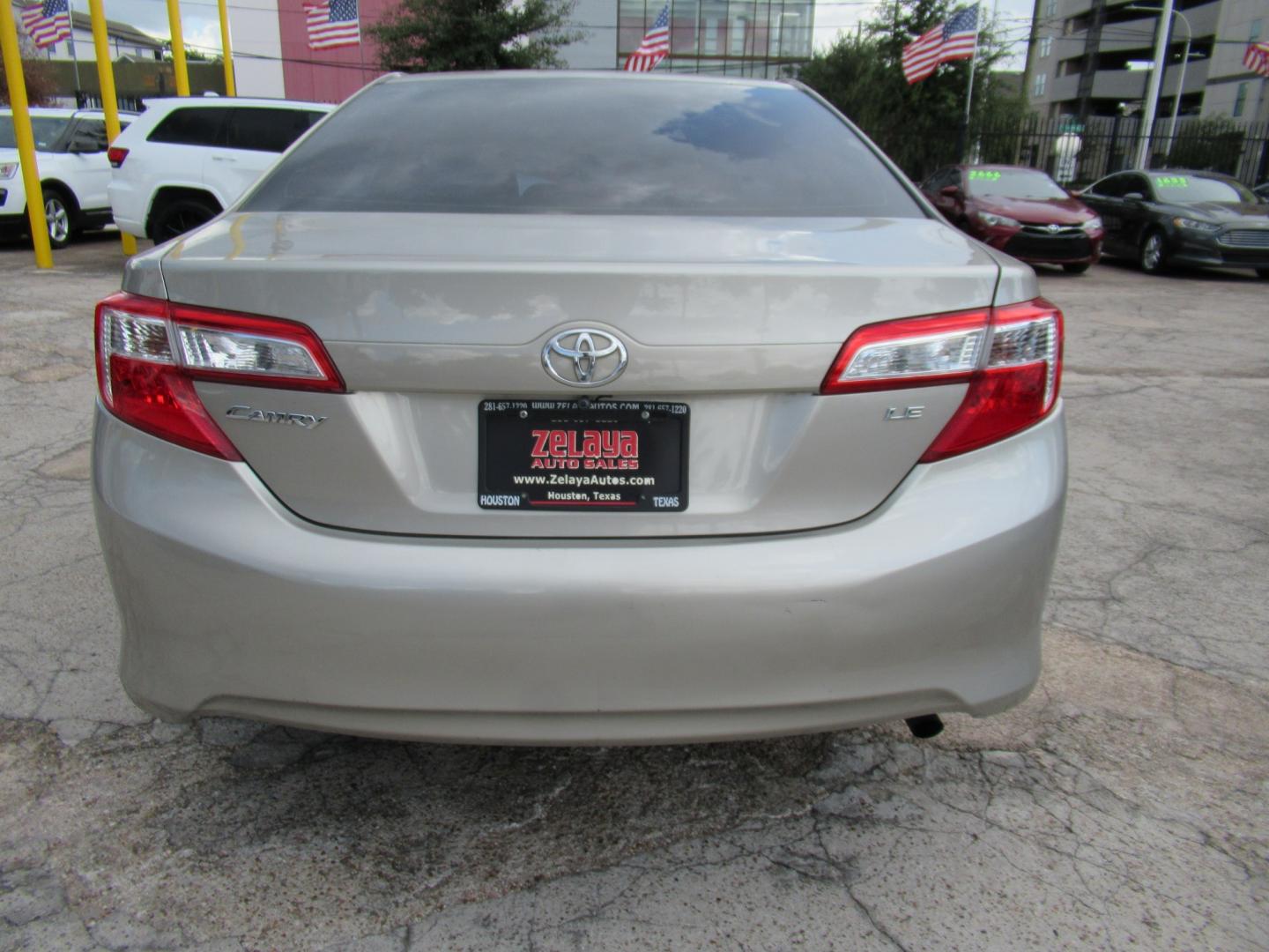 2014 Gold /Tan Toyota Camry L (4T4BF1FK2ER) with an 2.5L L4 DOHC 16V engine, Automatic transmission, located at 1511 North Shepherd Dr., Houston, TX, 77008, (281) 657-1221, 29.798361, -95.412560 - 2014 TOYOTA CAMRY LE VIN: 4T4BF1FK2ER364962 4 T 4 B F 1 F K 2 E R 3 6 4 9 6 2 SEDAN 4 DR 2.5L I4 F DOHC 16V GASOLINE FRONT WHEEL DRIVE- Photo#15