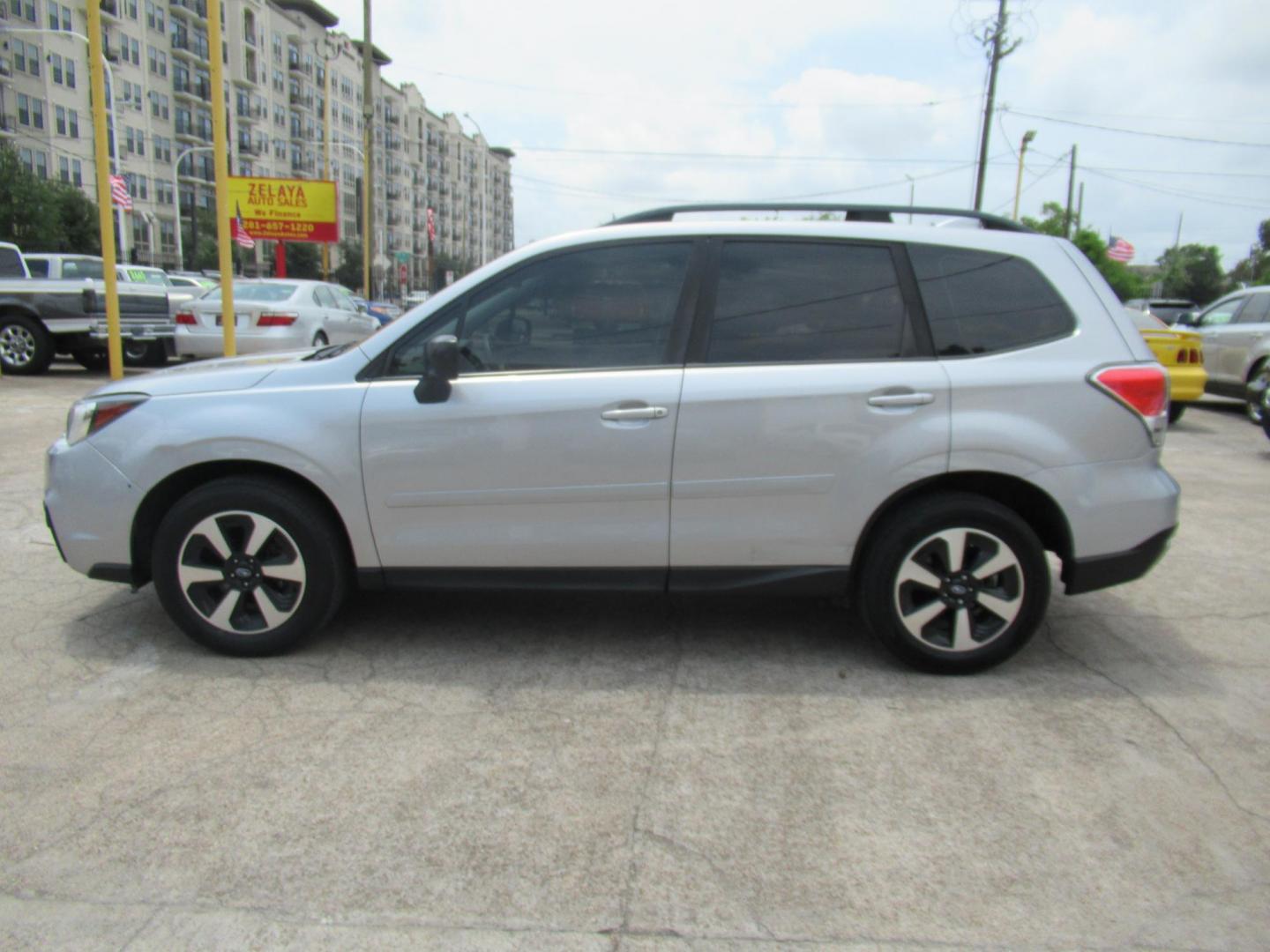 2018 Silver /Black Subaru Forester 2.5I (JF2SJABC5JH) with an 2.5L H4 F DOHC 16V engine, Automatic transmission, located at 1511 North Shepherd Dr., Houston, TX, 77008, (281) 657-1221, 29.798361, -95.412560 - 2018 SUBARU FORESTER 2.5I VIN: JF2SJABC5JH521576 J F 2 S J A B C 5 J H 5 2 1 5 7 6 4 DOOR WAGON/SPORT UTILITY 2.5L H4 F DOHC 16V GASOLINE ALL WHEEL DRIVE - Photo#24