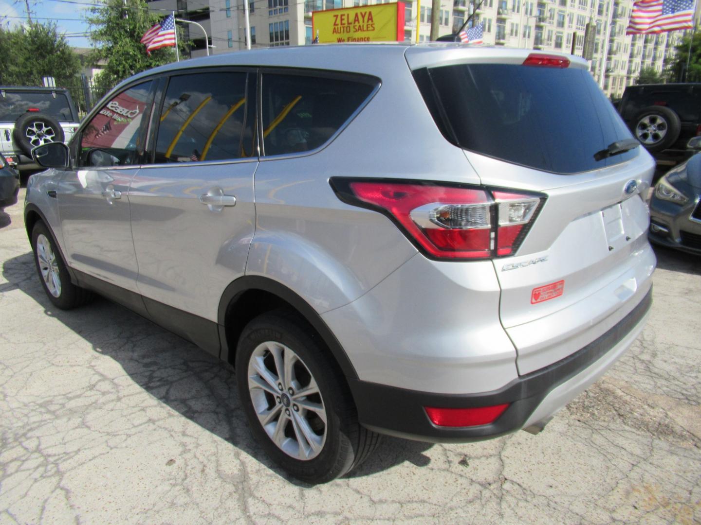 2017 Silver /Black Ford Escape SE FWD (1FMCU0GDXHU) with an 1.5L L4 DOHC 16V engine, Automatic transmission, located at 1511 North Shepherd Dr., Houston, TX, 77008, (281) 657-1221, 29.798361, -95.412560 - 2017 FORD ESCAPE SE VIN: 1FMCU0GDXHUE54105 1 F M C U 0 G D X H U E 5 4 1 0 5 4 DOOR WAGON/SPORT UTILITY 1.5L I4 F DOHC 16V GASOLINE FRONT WHEEL DRIVE- Photo#16