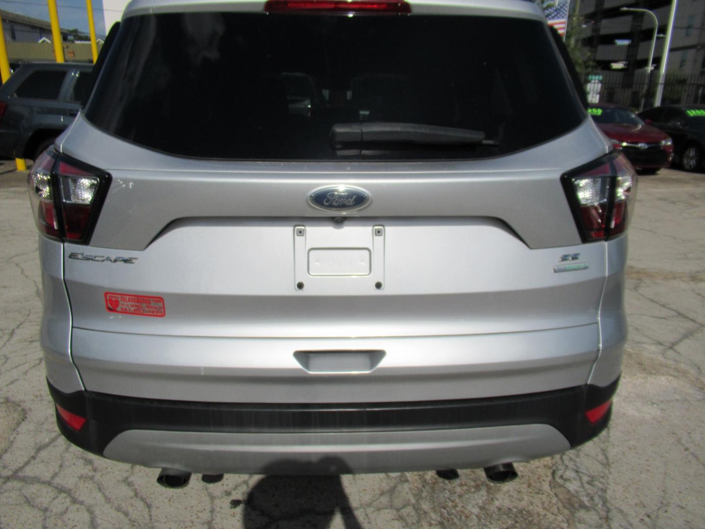 2017 Silver /Black Ford Escape SE FWD (1FMCU0GDXHU) with an 1.5L L4 DOHC 16V engine, Automatic transmission, located at 1511 North Shepherd Dr., Houston, TX, 77008, (281) 657-1221, 29.798361, -95.412560 - 2017 FORD ESCAPE SE VIN: 1FMCU0GDXHUE54105 1 F M C U 0 G D X H U E 5 4 1 0 5 4 DOOR WAGON/SPORT UTILITY 1.5L I4 F DOHC 16V GASOLINE FRONT WHEEL DRIVE- Photo#17