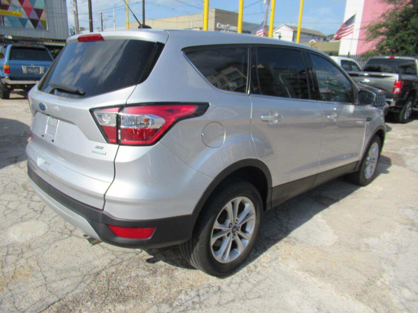 2017 Silver /Black Ford Escape SE FWD (1FMCU0GDXHU) with an 1.5L L4 DOHC 16V engine, Automatic transmission, located at 1511 North Shepherd Dr., Houston, TX, 77008, (281) 657-1221, 29.798361, -95.412560 - 2017 FORD ESCAPE SE VIN: 1FMCU0GDXHUE54105 1 F M C U 0 G D X H U E 5 4 1 0 5 4 DOOR WAGON/SPORT UTILITY 1.5L I4 F DOHC 16V GASOLINE FRONT WHEEL DRIVE- Photo#18