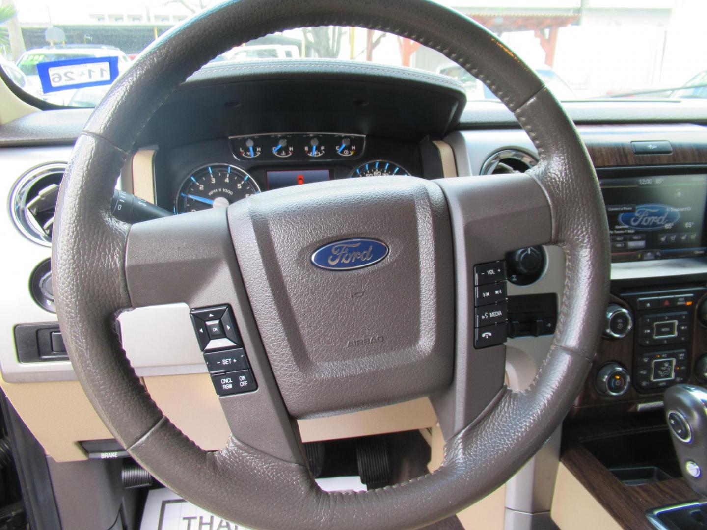 2013 Black /Tan Ford F-150 Lariat (1FTFW1CT3DK) with an 3.5 engine, Automatic transmission, located at 1511 North Shepherd Dr., Houston, TX, 77008, (281) 657-1221, 29.798361, -95.412560- Photo#5