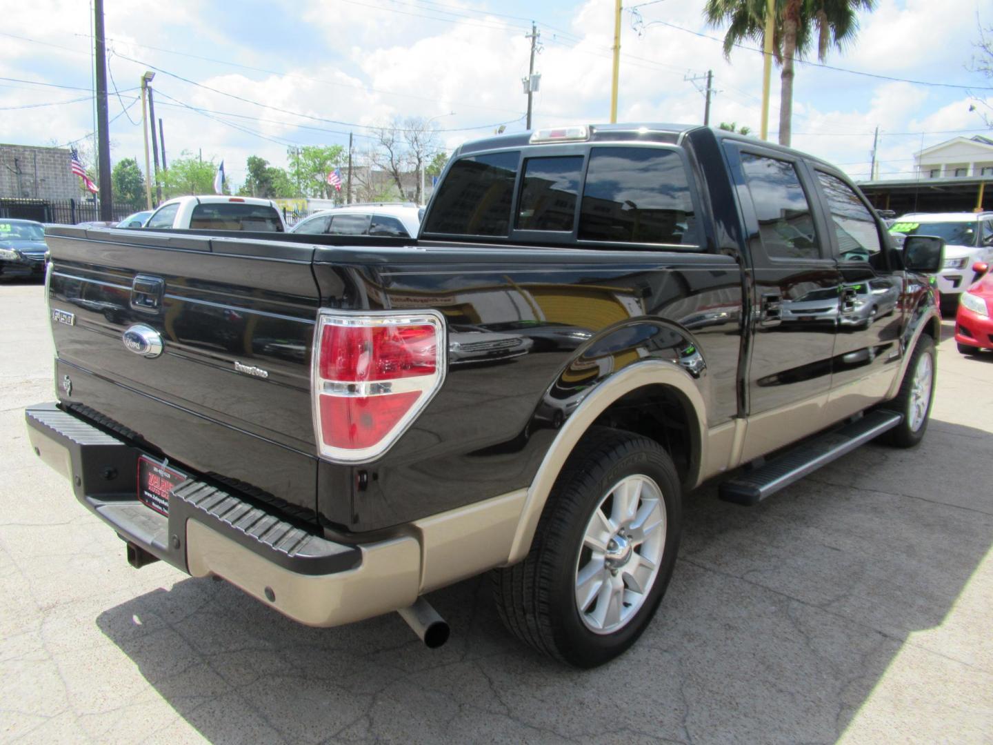 2013 Black /Tan Ford F-150 Lariat (1FTFW1CT3DK) with an 3.5 engine, Automatic transmission, located at 1511 North Shepherd Dr., Houston, TX, 77008, (281) 657-1221, 29.798361, -95.412560- Photo#26