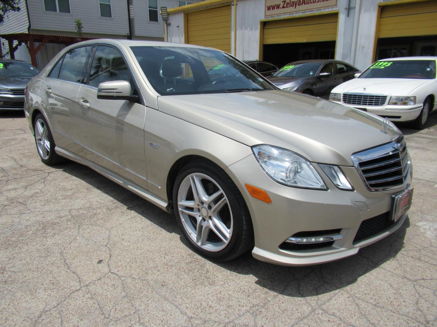 2012 Gold /Tan Mercedes-Benz E-Class E350 Sedan (WDDHF5KB5CA) with an 3.5L V6 DOHC 24V engine, Automatic transmission, located at 1511 North Shepherd Dr., Houston, TX, 77008, (281) 657-1221, 29.798361, -95.412560 - Mercedes-Benz E-Class E350 Sedan SEDAN 4-DR 3.5L V6 DOHC 24V V6 Automatic RWD - Photo#21
