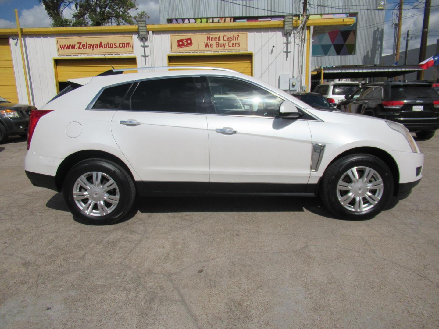 2013 White /Tan Cadillac SRX Base (3GYFNGE37DS) with an 3.6L V6 DOHC 24V FFV engine, Automatic transmission, located at 1511 North Shepherd Dr., Houston, TX, 77008, (281) 657-1221, 29.798361, -95.412560 - 2013 CADILLAC SRX LUXURY COLLECTION VIN: 3GYFNGE37DS645504 3 G Y F N G E 3 7 D S 6 4 5 5 0 4 4 DOOR WAGON/SPORT UTILITY 3.6L V6 F DOHC 24V GASOLINE ALL WHEEL DRIVE - Photo#0
