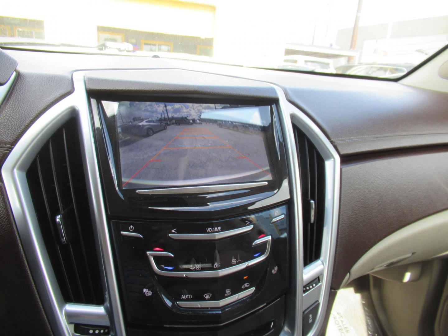 2013 White /Tan Cadillac SRX Base (3GYFNGE37DS) with an 3.6L V6 DOHC 24V FFV engine, Automatic transmission, located at 1511 North Shepherd Dr., Houston, TX, 77008, (281) 657-1221, 29.798361, -95.412560 - 2013 CADILLAC SRX LUXURY COLLECTION VIN: 3GYFNGE37DS645504 3 G Y F N G E 3 7 D S 6 4 5 5 0 4 4 DOOR WAGON/SPORT UTILITY 3.6L V6 F DOHC 24V GASOLINE ALL WHEEL DRIVE - Photo#21