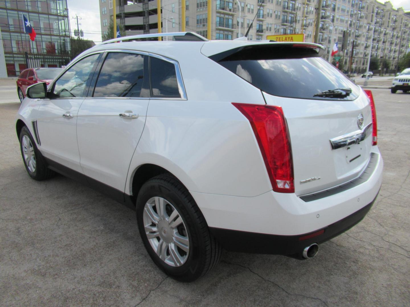 2013 White /Tan Cadillac SRX Base (3GYFNGE37DS) with an 3.6L V6 DOHC 24V FFV engine, Automatic transmission, located at 1511 North Shepherd Dr., Houston, TX, 77008, (281) 657-1221, 29.798361, -95.412560 - 2013 CADILLAC SRX LUXURY COLLECTION VIN: 3GYFNGE37DS645504 3 G Y F N G E 3 7 D S 6 4 5 5 0 4 4 DOOR WAGON/SPORT UTILITY 3.6L V6 F DOHC 24V GASOLINE ALL WHEEL DRIVE - Photo#22