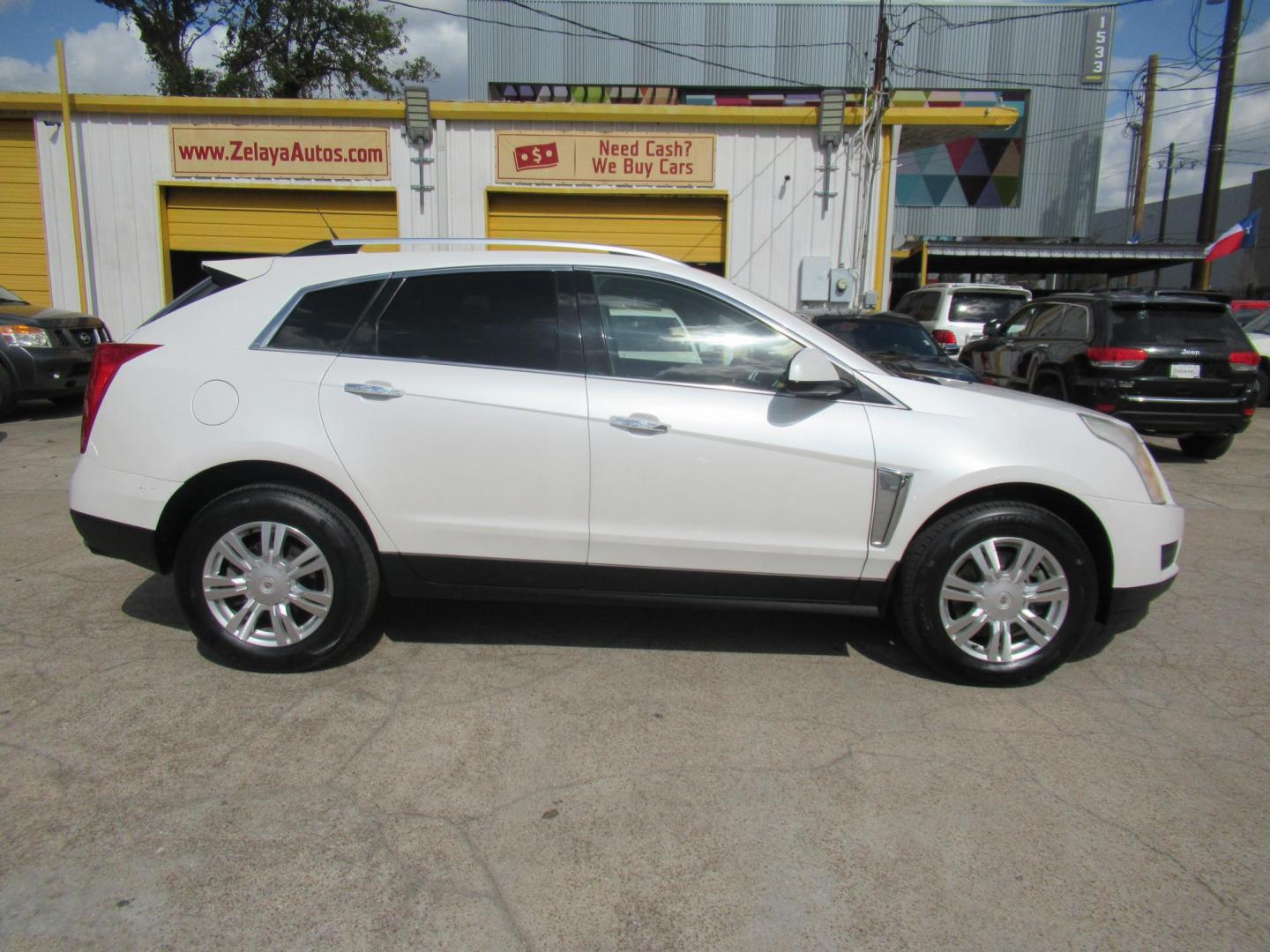 2013 White /Tan Cadillac SRX Base (3GYFNGE37DS) with an 3.6L V6 DOHC 24V FFV engine, Automatic transmission, located at 1511 North Shepherd Dr., Houston, TX, 77008, (281) 657-1221, 29.798361, -95.412560 - 2013 CADILLAC SRX LUXURY COLLECTION VIN: 3GYFNGE37DS645504 3 G Y F N G E 3 7 D S 6 4 5 5 0 4 4 DOOR WAGON/SPORT UTILITY 3.6L V6 F DOHC 24V GASOLINE ALL WHEEL DRIVE - Photo#23