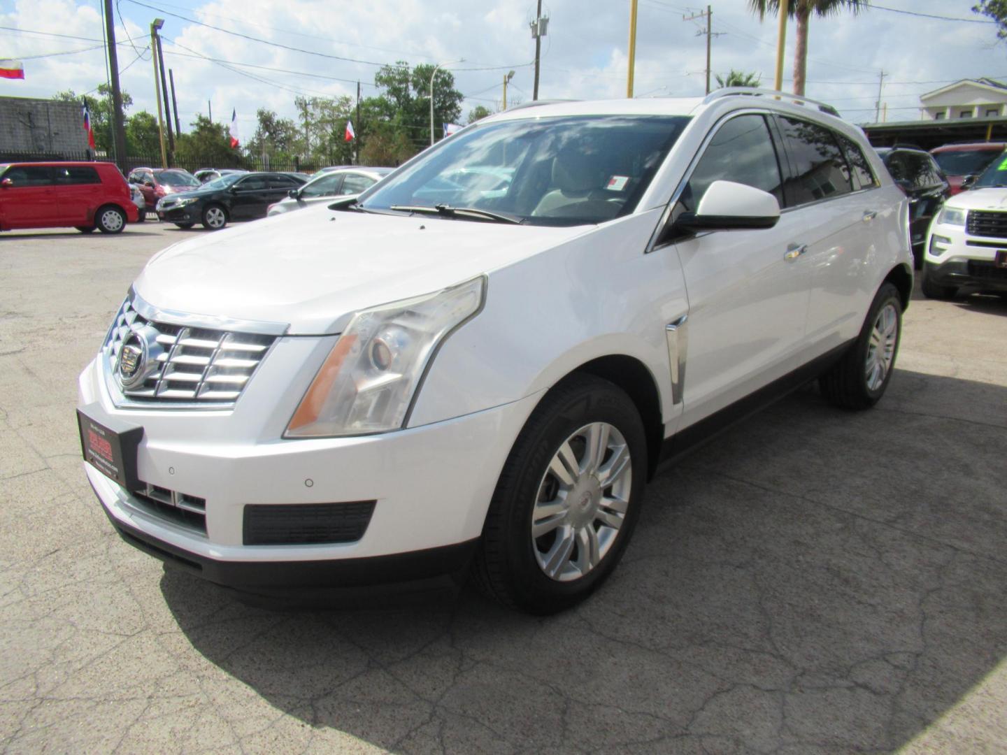 2013 White /Tan Cadillac SRX Base (3GYFNGE37DS) with an 3.6L V6 DOHC 24V FFV engine, Automatic transmission, located at 1511 North Shepherd Dr., Houston, TX, 77008, (281) 657-1221, 29.798361, -95.412560 - 2013 CADILLAC SRX LUXURY COLLECTION VIN: 3GYFNGE37DS645504 3 G Y F N G E 3 7 D S 6 4 5 5 0 4 4 DOOR WAGON/SPORT UTILITY 3.6L V6 F DOHC 24V GASOLINE ALL WHEEL DRIVE - Photo#29