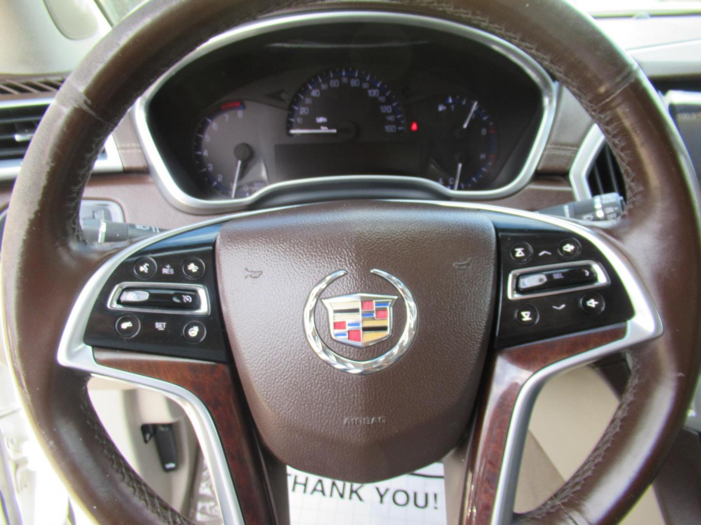 2013 White /Tan Cadillac SRX Base (3GYFNGE37DS) with an 3.6L V6 DOHC 24V FFV engine, Automatic transmission, located at 1511 North Shepherd Dr., Houston, TX, 77008, (281) 657-1221, 29.798361, -95.412560 - 2013 CADILLAC SRX LUXURY COLLECTION VIN: 3GYFNGE37DS645504 3 G Y F N G E 3 7 D S 6 4 5 5 0 4 4 DOOR WAGON/SPORT UTILITY 3.6L V6 F DOHC 24V GASOLINE ALL WHEEL DRIVE - Photo#4
