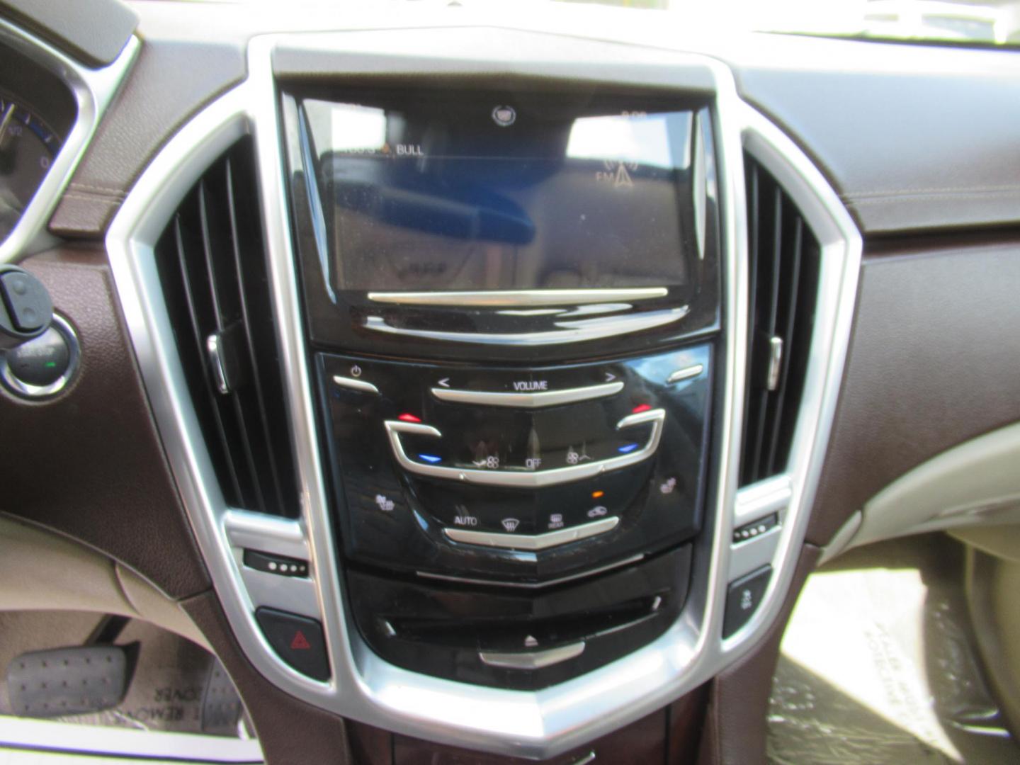 2013 White /Tan Cadillac SRX Base (3GYFNGE37DS) with an 3.6L V6 DOHC 24V FFV engine, Automatic transmission, located at 1511 North Shepherd Dr., Houston, TX, 77008, (281) 657-1221, 29.798361, -95.412560 - 2013 CADILLAC SRX LUXURY COLLECTION VIN: 3GYFNGE37DS645504 3 G Y F N G E 3 7 D S 6 4 5 5 0 4 4 DOOR WAGON/SPORT UTILITY 3.6L V6 F DOHC 24V GASOLINE ALL WHEEL DRIVE - Photo#5