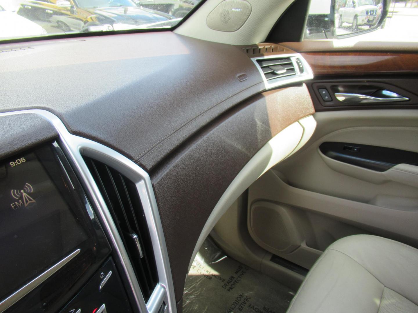 2013 White /Tan Cadillac SRX Base (3GYFNGE37DS) with an 3.6L V6 DOHC 24V FFV engine, Automatic transmission, located at 1511 North Shepherd Dr., Houston, TX, 77008, (281) 657-1221, 29.798361, -95.412560 - 2013 CADILLAC SRX LUXURY COLLECTION VIN: 3GYFNGE37DS645504 3 G Y F N G E 3 7 D S 6 4 5 5 0 4 4 DOOR WAGON/SPORT UTILITY 3.6L V6 F DOHC 24V GASOLINE ALL WHEEL DRIVE - Photo#6