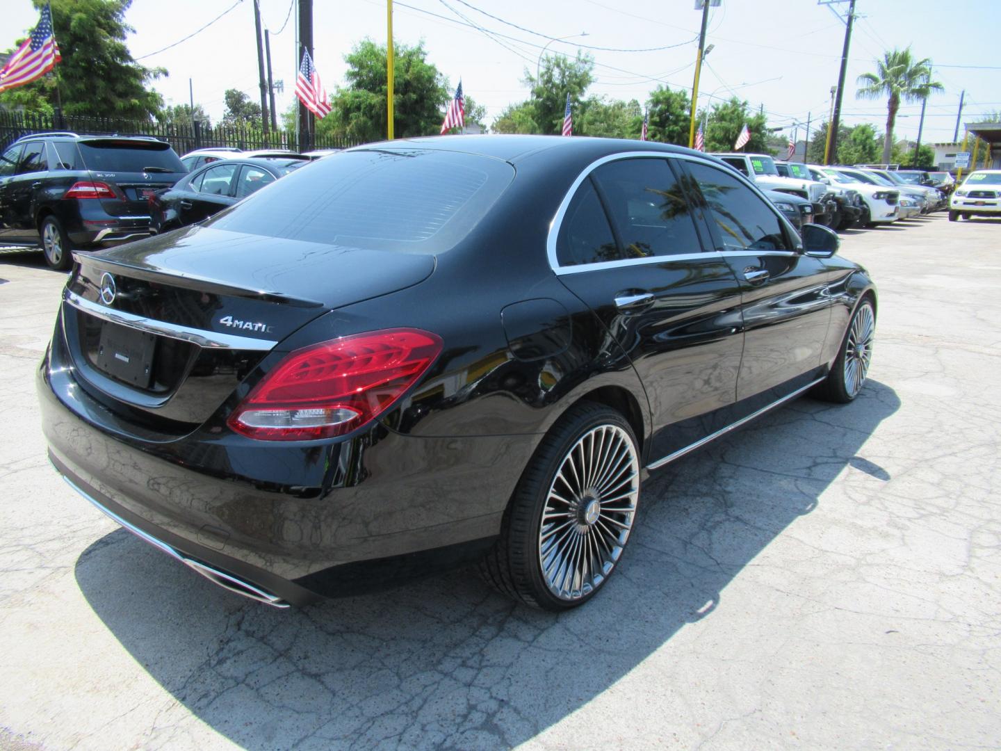 2016 Black /Black Mercedes-Benz C-Class C300 4MATIC Sedan (55SWF4KB6GU) with an 2.0L L4 DOHC 16V engine, 7A transmission, located at 1511 North Shepherd Dr., Houston, TX, 77008, (281) 657-1221, 29.798361, -95.412560 - 2016 MERCEDES-BENZ C-CLASS C 300 4MATIC VIN: 55SWF4KB6GU137937 5 5 S W F 4 K B 6 G U 1 3 7 9 3 7 SEDAN 4 DR 2.0L I4 F DOHC 16V GASOLINE ALL WHEEL DRIVE- Photo#19