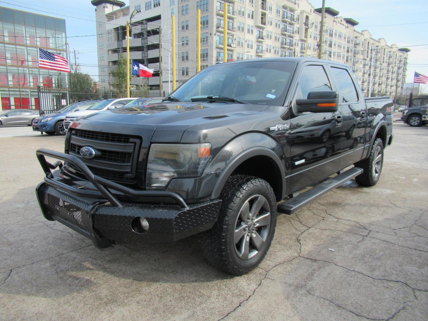 2014 Black /Black Ford F-150 FX4 SuperCrew 5.5-ft. Bed 4WD (1FTFW1ET3EK) with an 3.5L V6 TURBO engine, Automatic transmission, located at 1511 North Shepherd Dr., Houston, TX, 77008, (281) 657-1221, 29.798361, -95.412560 - 2014 FORD F-150 FX4 VIN: 1FTFW1ET3EKF20416 1 F T F W 1 E T 3 E K F 2 0 4 1 6 CREW PICKUP 3.5L V6 F DOHC 24V GASOLINE REAR WHEEL DRIVE W/ 4X4 - Photo#27