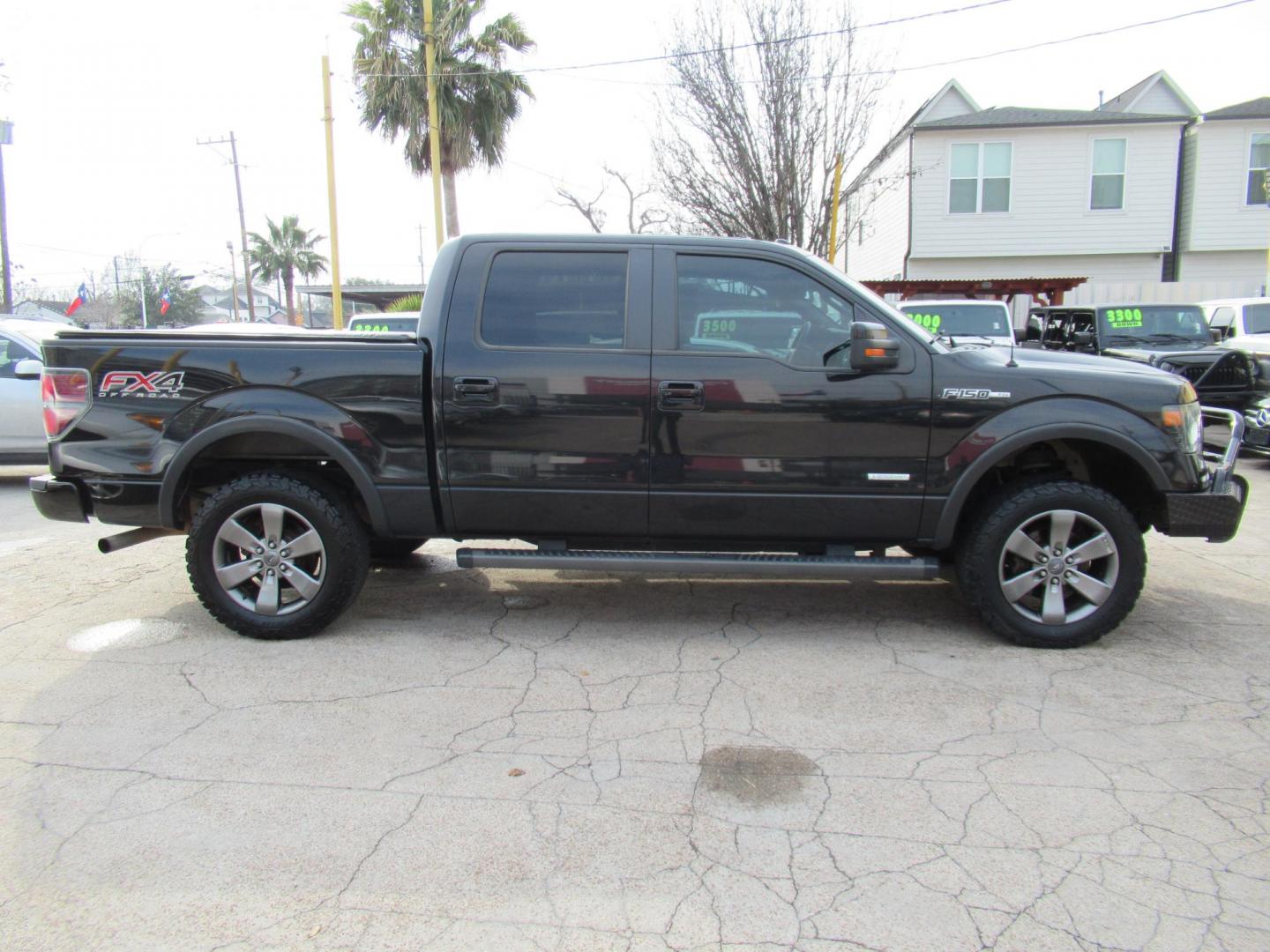 2014 Black /Black Ford F-150 FX4 SuperCrew 5.5-ft. Bed 4WD (1FTFW1ET3EK) with an 3.5L V6 TURBO engine, Automatic transmission, located at 1511 North Shepherd Dr., Houston, TX, 77008, (281) 657-1221, 29.798361, -95.412560 - 2014 FORD F-150 FX4 VIN: 1FTFW1ET3EKF20416 1 F T F W 1 E T 3 E K F 2 0 4 1 6 CREW PICKUP 3.5L V6 F DOHC 24V GASOLINE REAR WHEEL DRIVE W/ 4X4 - Photo#30