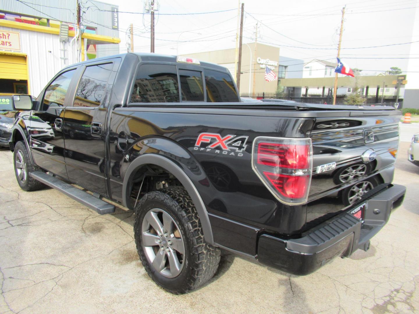 2014 Black /Black Ford F-150 FX4 SuperCrew 5.5-ft. Bed 4WD (1FTFW1ET3EK) with an 3.5L V6 TURBO engine, Automatic transmission, located at 1511 North Shepherd Dr., Houston, TX, 77008, (281) 657-1221, 29.798361, -95.412560 - 2014 FORD F-150 FX4 VIN: 1FTFW1ET3EKF20416 1 F T F W 1 E T 3 E K F 2 0 4 1 6 CREW PICKUP 3.5L V6 F DOHC 24V GASOLINE REAR WHEEL DRIVE W/ 4X4 - Photo#31