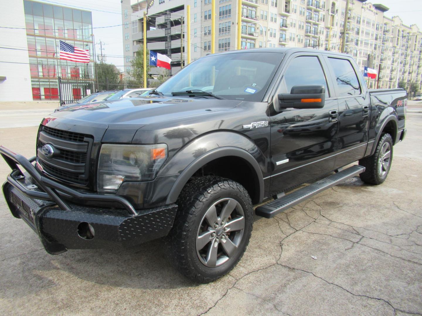 2014 Black /Black Ford F-150 FX4 SuperCrew 5.5-ft. Bed 4WD (1FTFW1ET3EK) with an 3.5L V6 TURBO engine, Automatic transmission, located at 1511 North Shepherd Dr., Houston, TX, 77008, (281) 657-1221, 29.798361, -95.412560 - 2014 FORD F-150 FX4 VIN: 1FTFW1ET3EKF20416 1 F T F W 1 E T 3 E K F 2 0 4 1 6 CREW PICKUP 3.5L V6 F DOHC 24V GASOLINE REAR WHEEL DRIVE W/ 4X4 - Photo#32