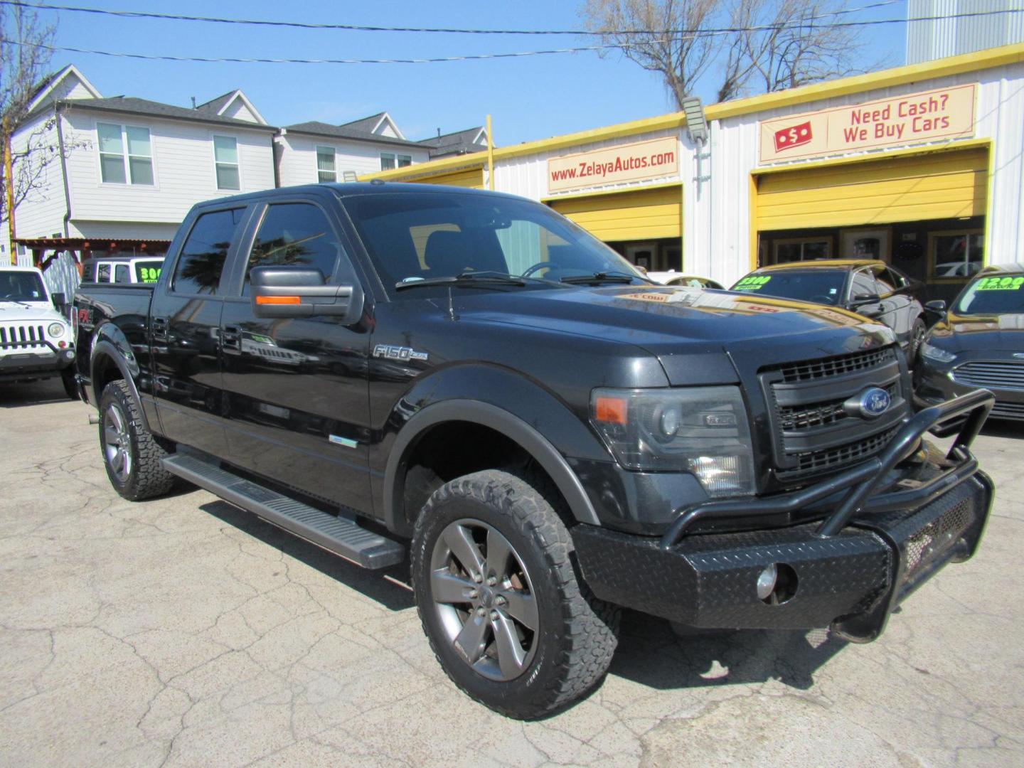 2014 Black /Black Ford F-150 FX4 SuperCrew 5.5-ft. Bed 4WD (1FTFW1ET3EK) with an 3.5L V6 TURBO engine, Automatic transmission, located at 1511 North Shepherd Dr., Houston, TX, 77008, (281) 657-1221, 29.798361, -95.412560 - 2014 FORD F-150 FX4 VIN: 1FTFW1ET3EKF20416 1 F T F W 1 E T 3 E K F 2 0 4 1 6 CREW PICKUP 3.5L V6 F DOHC 24V GASOLINE REAR WHEEL DRIVE W/ 4X4 - Photo#37