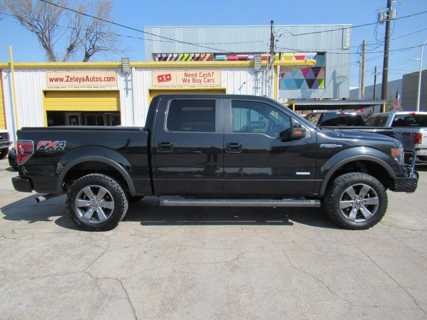 2014 Black /Black Ford F-150 FX4 SuperCrew 5.5-ft. Bed 4WD (1FTFW1ET3EK) with an 3.5L V6 TURBO engine, Automatic transmission, located at 1511 North Shepherd Dr., Houston, TX, 77008, (281) 657-1221, 29.798361, -95.412560 - 2014 FORD F-150 FX4 VIN: 1FTFW1ET3EKF20416 1 F T F W 1 E T 3 E K F 2 0 4 1 6 CREW PICKUP 3.5L V6 F DOHC 24V GASOLINE REAR WHEEL DRIVE W/ 4X4 - Photo#38