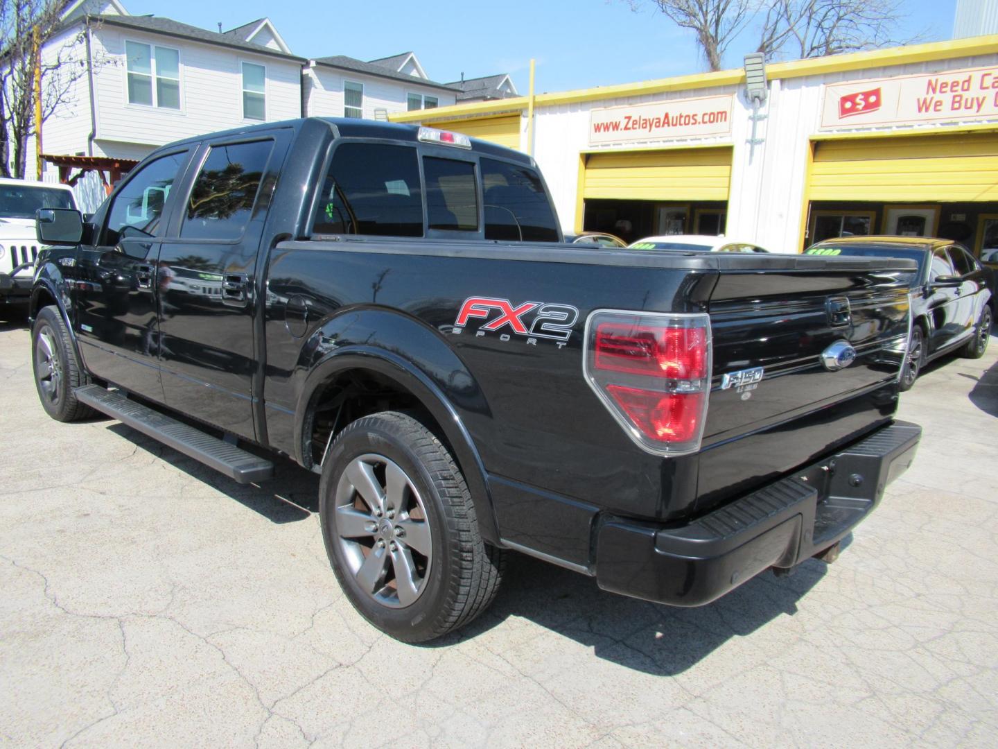 2014 Black /Black Ford F-150 Platinum SuperCrew 6.5-ft. Bed 2WD (1FTFW1CT5EF) with an 3.5L V6 TURBO engine, Automatic transmission, located at 1511 North Shepherd Dr., Houston, TX, 77008, (281) 657-1221, 29.798361, -95.412560 - 2014 FORD F-150 XLT FX2 VIN: 1FTFW1CT5EFB68967 1 F T F W 1 C T 5 E F B 6 8 9 6 7 CREW PICKUP 3.5L V6 F DOHC 24V GASOLINE REAR WHEEL DRIVE - Photo#34