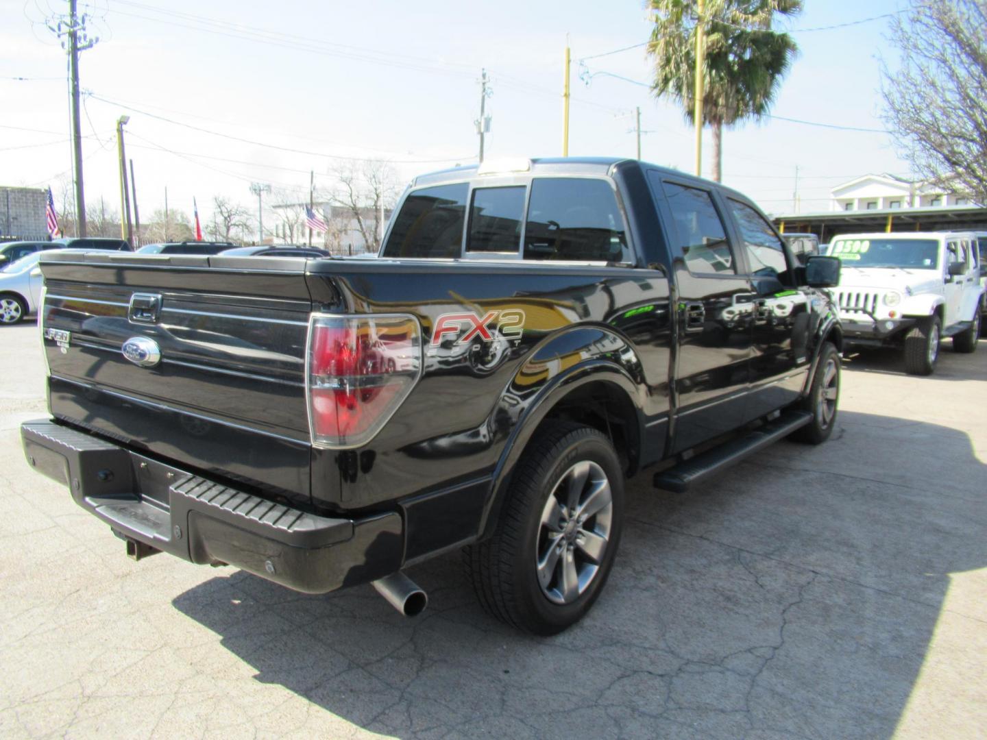 2014 Black /Black Ford F-150 Platinum SuperCrew 6.5-ft. Bed 2WD (1FTFW1CT5EF) with an 3.5L V6 TURBO engine, Automatic transmission, located at 1511 North Shepherd Dr., Houston, TX, 77008, (281) 657-1221, 29.798361, -95.412560 - 2014 FORD F-150 XLT FX2 VIN: 1FTFW1CT5EFB68967 1 F T F W 1 C T 5 E F B 6 8 9 6 7 CREW PICKUP 3.5L V6 F DOHC 24V GASOLINE REAR WHEEL DRIVE - Photo#37