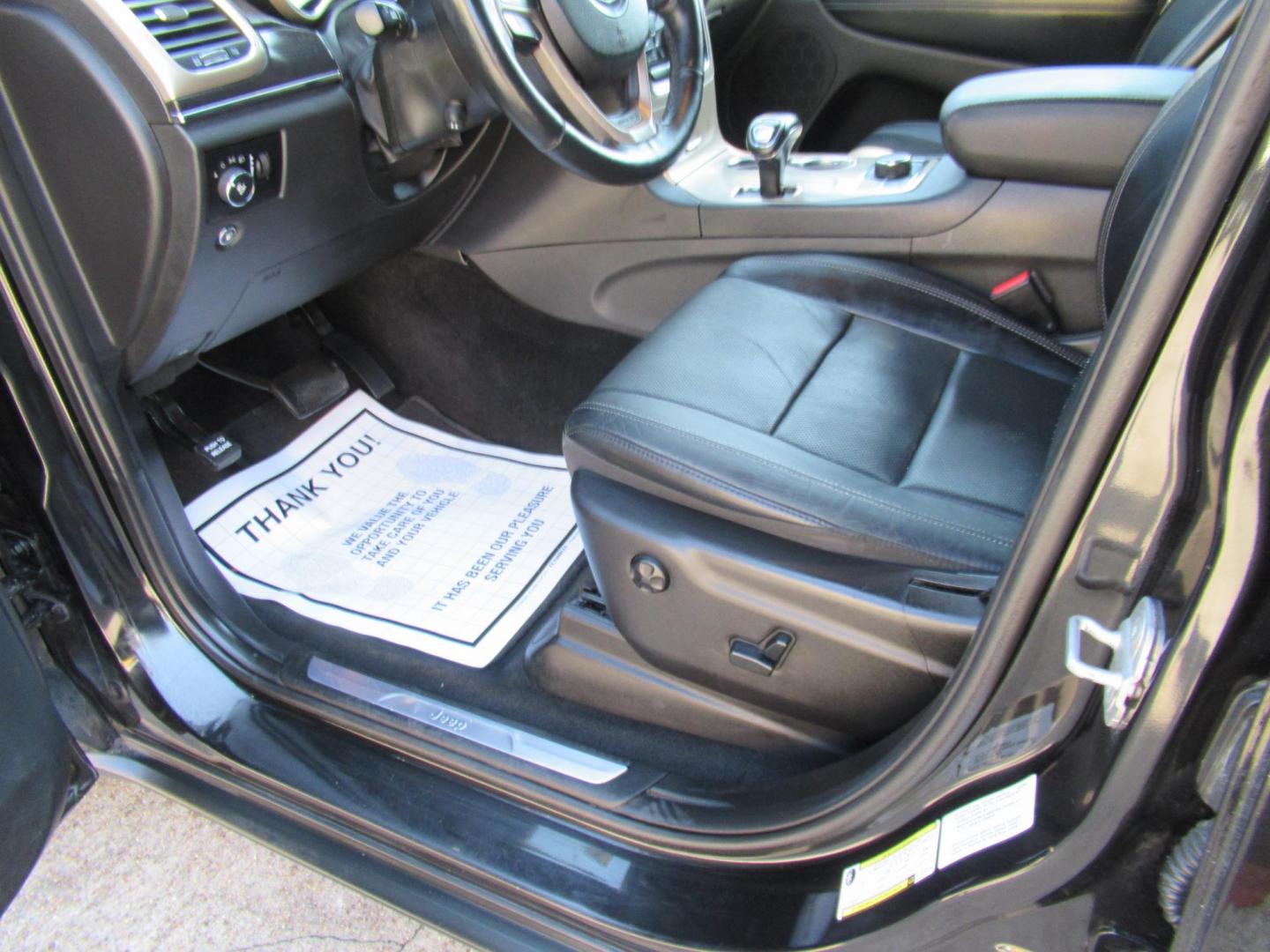 2014 Black /Black Jeep Grand Cherokee Limited 4WD (1C4RJFBG3EC) with an 3.6L V6 DOHC 24V engine, Automatic transmission, located at 1511 North Shepherd Dr., Houston, TX, 77008, (281) 657-1221, 29.798361, -95.412560 - 2014 JEEP GRAND CHEROKEE LIMITED VIN: 1C4RJFBG3EC152796 1 C 4 R J F B G 3 E C 1 5 2 7 9 6 4 DOOR WAGON/SPORT UTILITY 3.6L V6 F DOHC 24V GASOLINE REAR WHEEL DRIVE W/ 4X4 - Photo#10