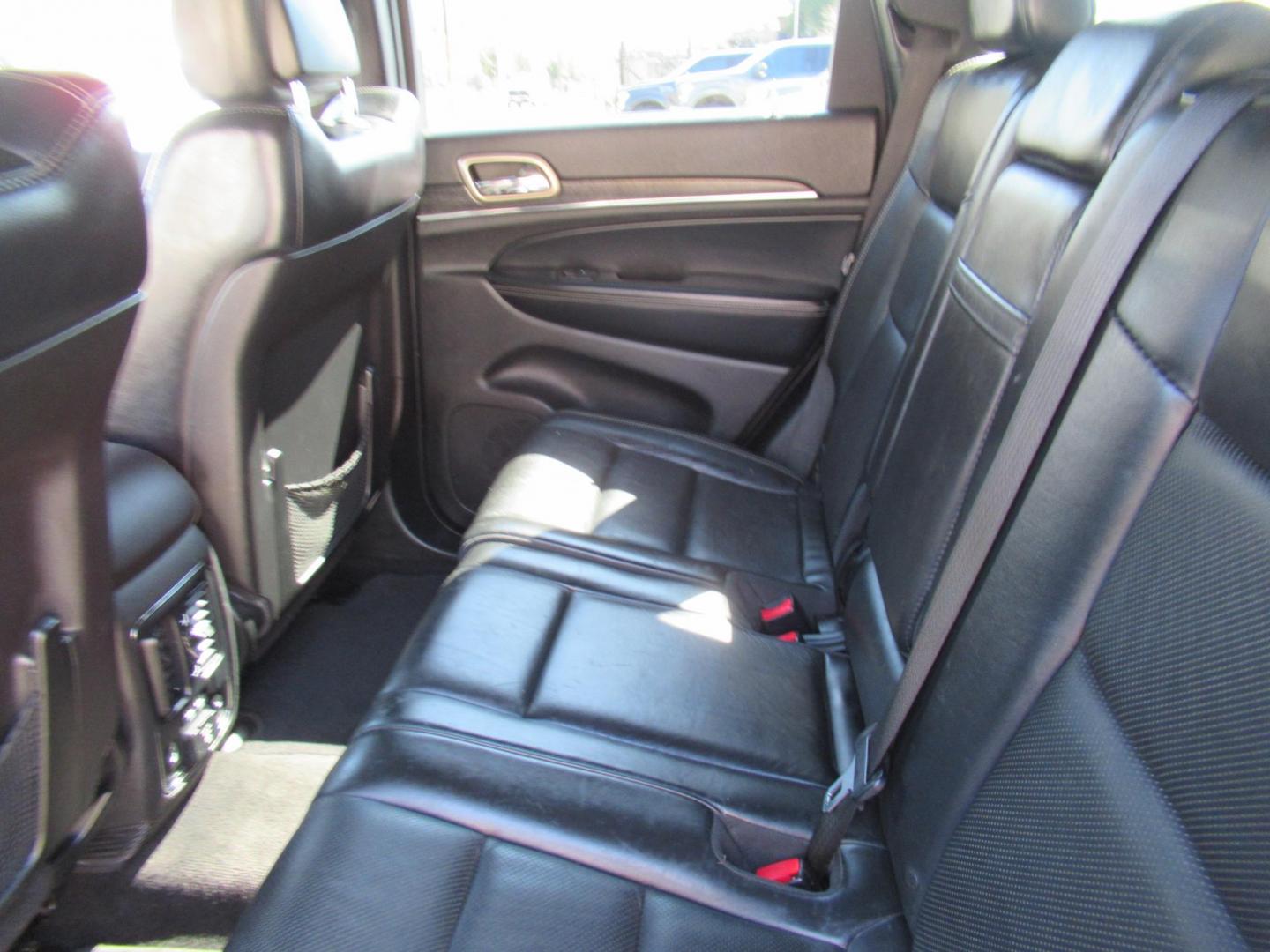 2014 Black /Black Jeep Grand Cherokee Limited 4WD (1C4RJFBG3EC) with an 3.6L V6 DOHC 24V engine, Automatic transmission, located at 1511 North Shepherd Dr., Houston, TX, 77008, (281) 657-1221, 29.798361, -95.412560 - 2014 JEEP GRAND CHEROKEE LIMITED VIN: 1C4RJFBG3EC152796 1 C 4 R J F B G 3 E C 1 5 2 7 9 6 4 DOOR WAGON/SPORT UTILITY 3.6L V6 F DOHC 24V GASOLINE REAR WHEEL DRIVE W/ 4X4 - Photo#11