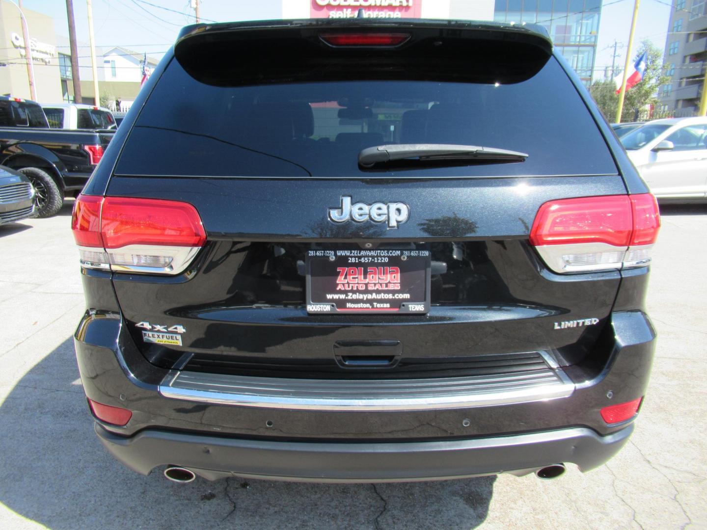 2014 Black /Black Jeep Grand Cherokee Limited 4WD (1C4RJFBG3EC) with an 3.6L V6 DOHC 24V engine, Automatic transmission, located at 1511 North Shepherd Dr., Houston, TX, 77008, (281) 657-1221, 29.798361, -95.412560 - 2014 JEEP GRAND CHEROKEE LIMITED VIN: 1C4RJFBG3EC152796 1 C 4 R J F B G 3 E C 1 5 2 7 9 6 4 DOOR WAGON/SPORT UTILITY 3.6L V6 F DOHC 24V GASOLINE REAR WHEEL DRIVE W/ 4X4 - Photo#20