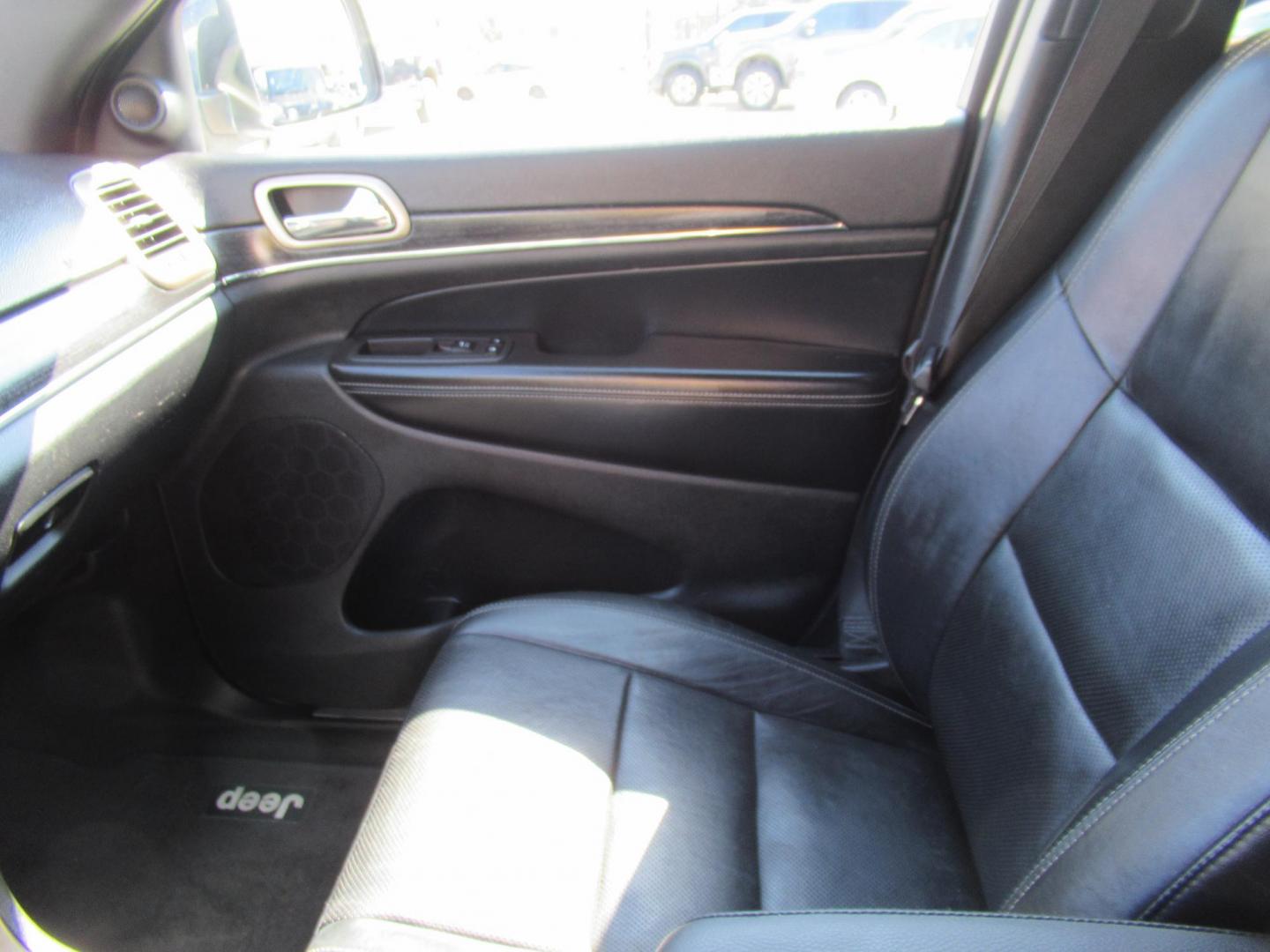 2014 Black /Black Jeep Grand Cherokee Limited 4WD (1C4RJFBG3EC) with an 3.6L V6 DOHC 24V engine, Automatic transmission, located at 1511 North Shepherd Dr., Houston, TX, 77008, (281) 657-1221, 29.798361, -95.412560 - 2014 JEEP GRAND CHEROKEE LIMITED VIN: 1C4RJFBG3EC152796 1 C 4 R J F B G 3 E C 1 5 2 7 9 6 4 DOOR WAGON/SPORT UTILITY 3.6L V6 F DOHC 24V GASOLINE REAR WHEEL DRIVE W/ 4X4 - Photo#6