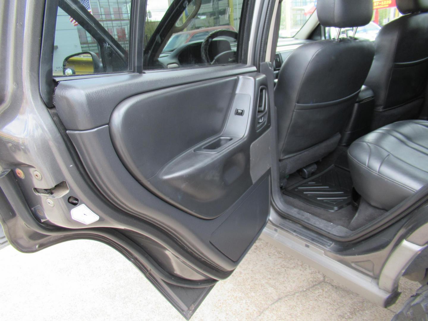 2002 Gray /Black Jeep Grand Cherokee Laredo 4WD (1J4GW48S32C) with an 4.0L L6 OHV 12V engine, 4-Speed Automatic Overdrive transmission, located at 1511 North Shepherd Dr., Houston, TX, 77008, (281) 657-1221, 29.798361, -95.412560 - 2002 JEEP GRAND CHEROKEE LAREDO VIN: 1J4GW48S32C228645 1 J 4 G W 4 8 S 3 2 C 2 2 8 6 4 5 4 DOOR WAGON/SPORT UTILITY 4.0L I6 F GASOLINE REAR WHEEL DRIVE W/ 4X4 - Photo#12
