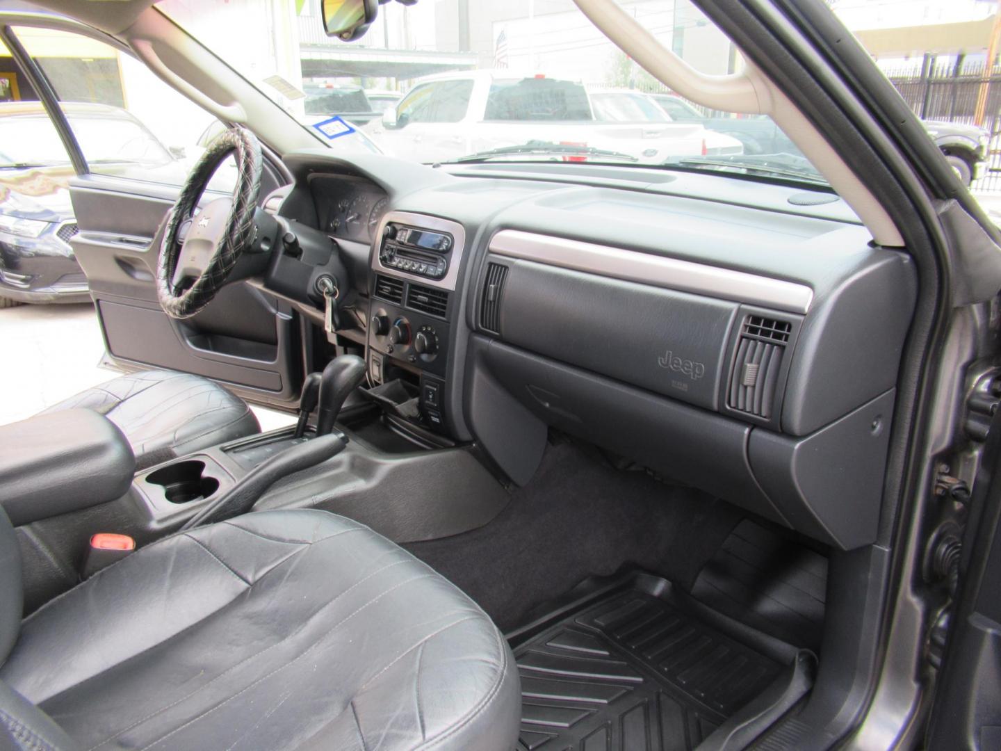 2002 Gray /Black Jeep Grand Cherokee Laredo 4WD (1J4GW48S32C) with an 4.0L L6 OHV 12V engine, 4-Speed Automatic Overdrive transmission, located at 1511 North Shepherd Dr., Houston, TX, 77008, (281) 657-1221, 29.798361, -95.412560 - 2002 JEEP GRAND CHEROKEE LAREDO VIN: 1J4GW48S32C228645 1 J 4 G W 4 8 S 3 2 C 2 2 8 6 4 5 4 DOOR WAGON/SPORT UTILITY 4.0L I6 F GASOLINE REAR WHEEL DRIVE W/ 4X4 - Photo#17